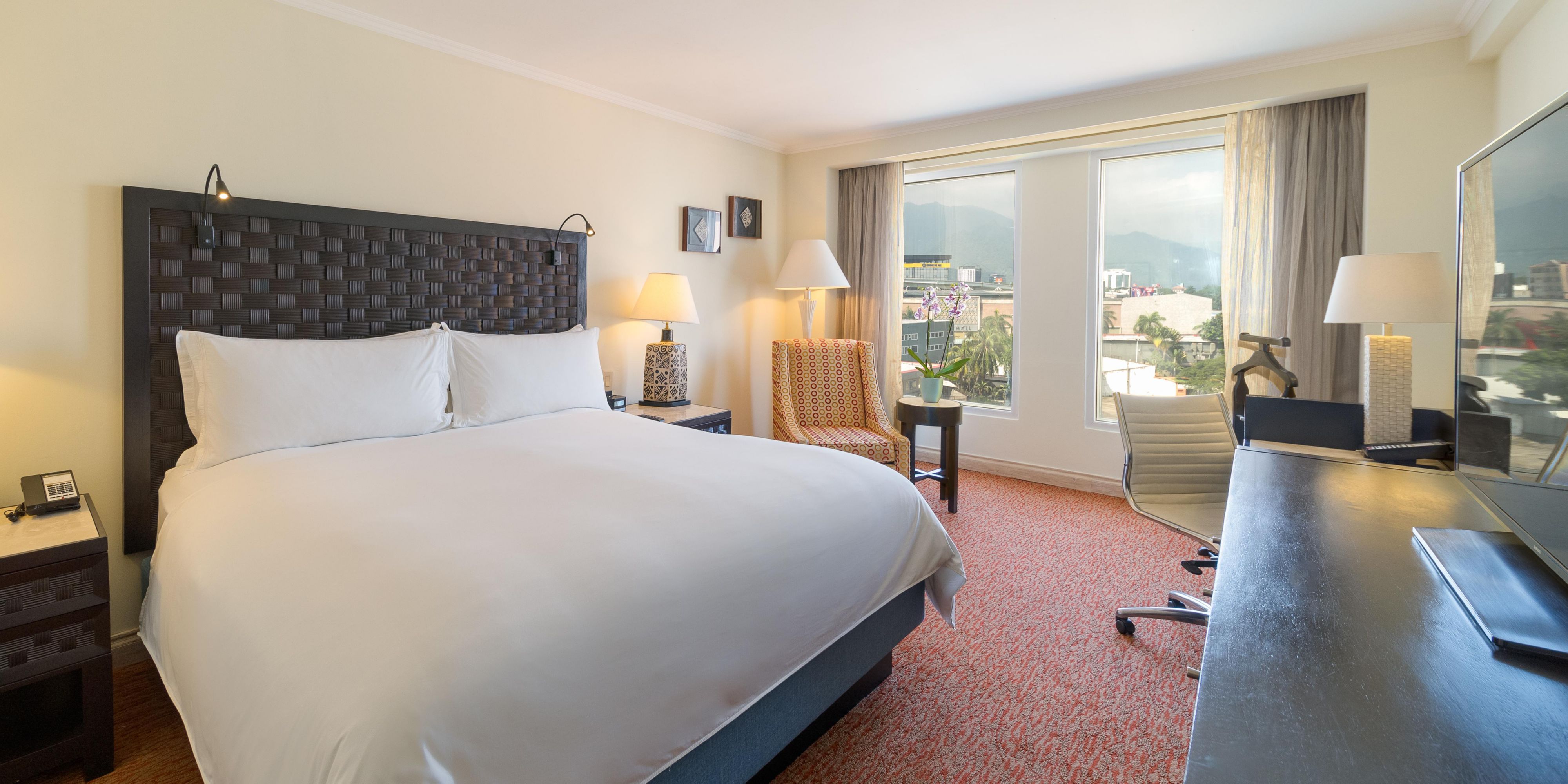 Pull back the covers, hop in, and catch your favorite TV show.