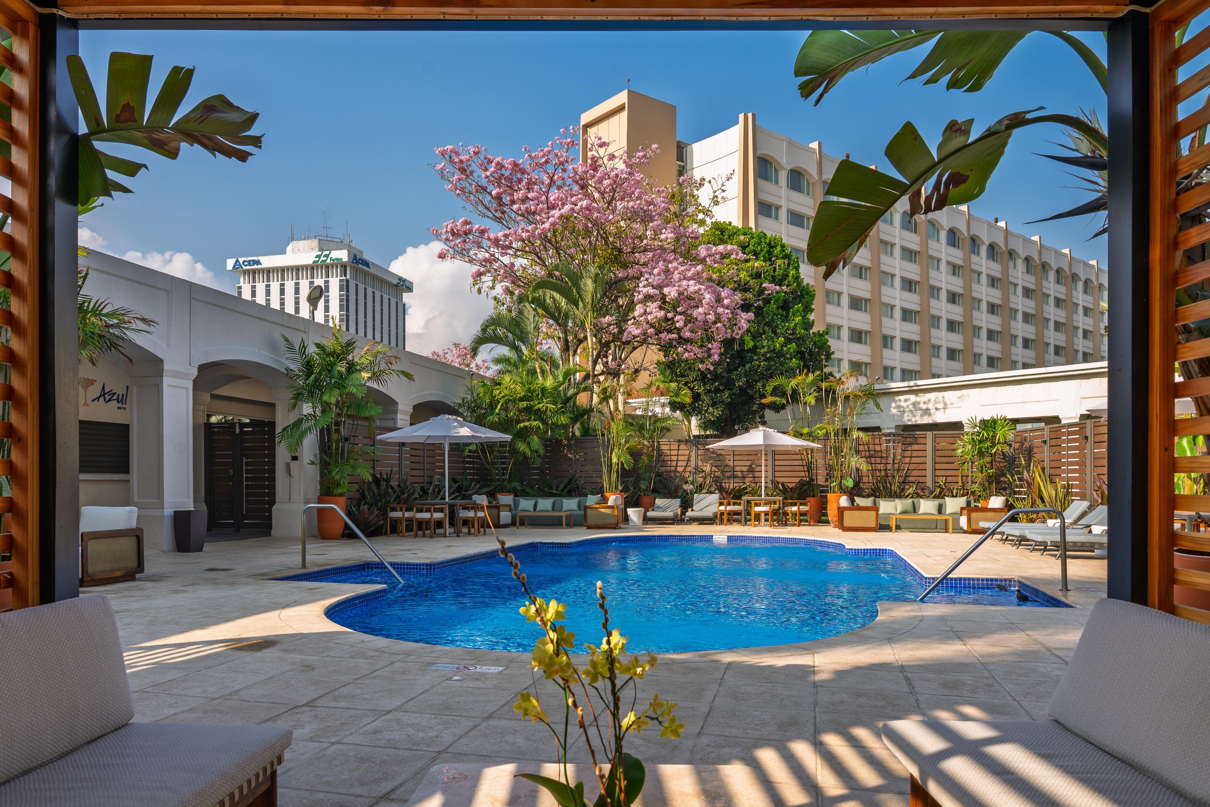 outdoor pool with cabanas 