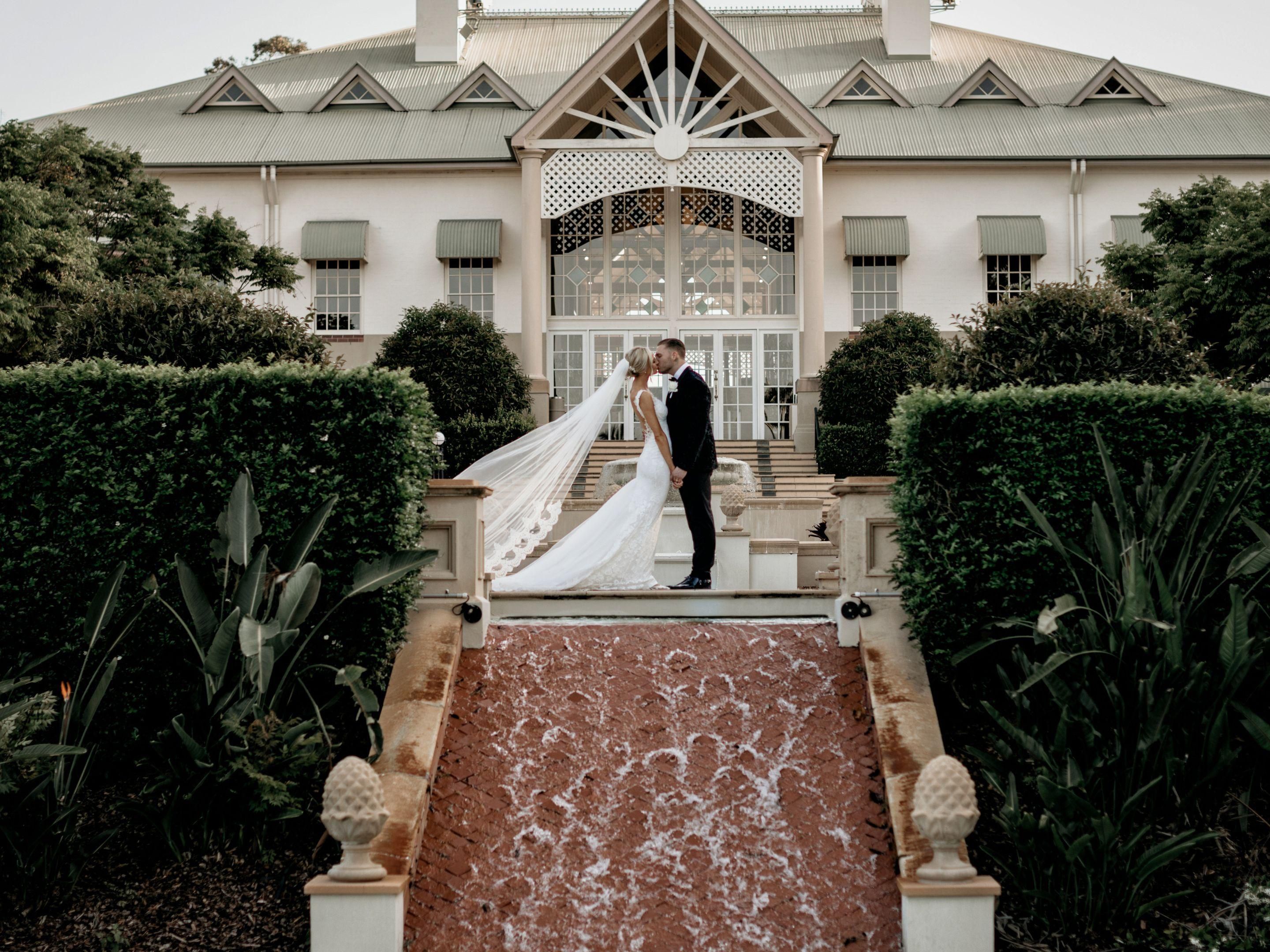 A wedding couple standing on the Fountain Terrace 