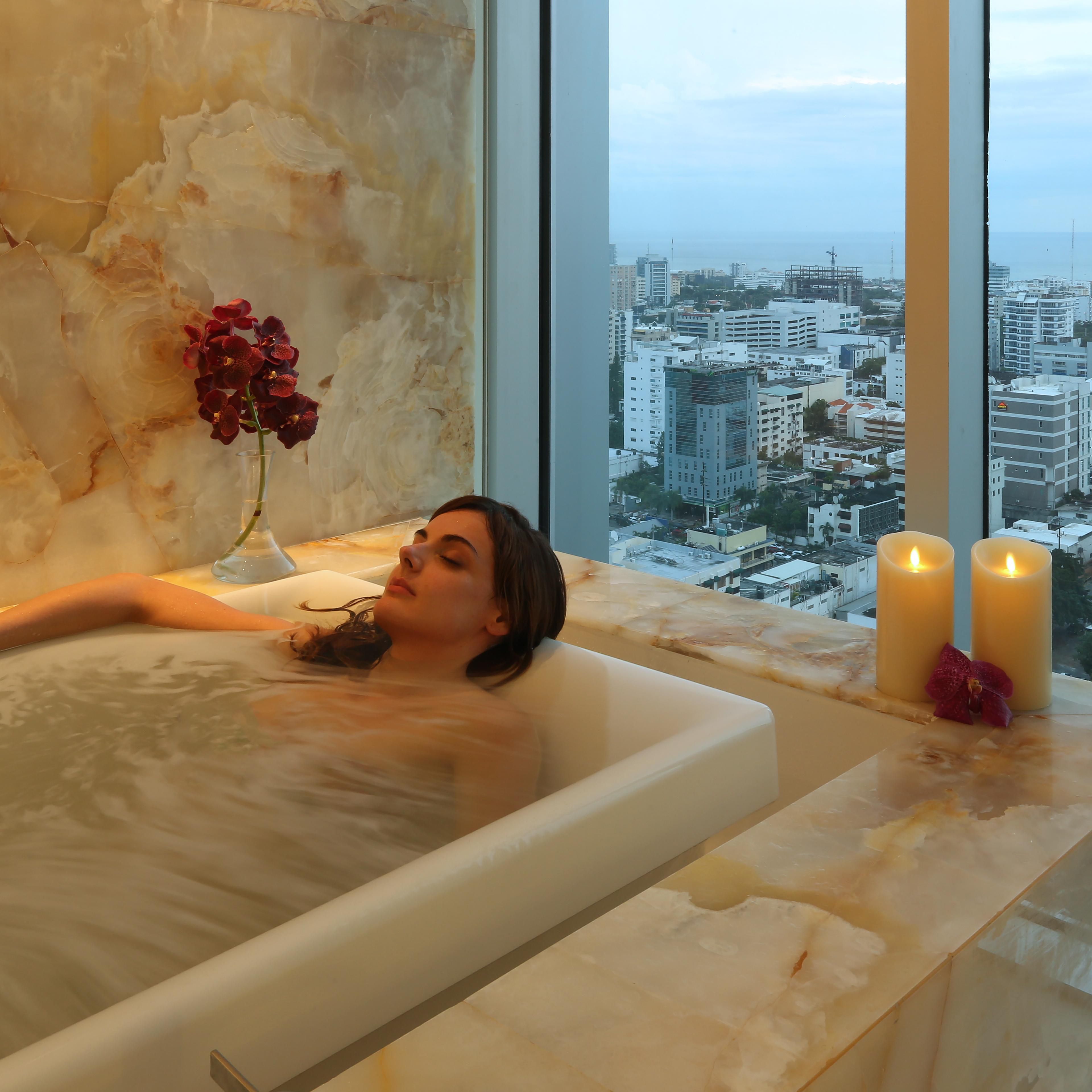 guest relaxing in tub