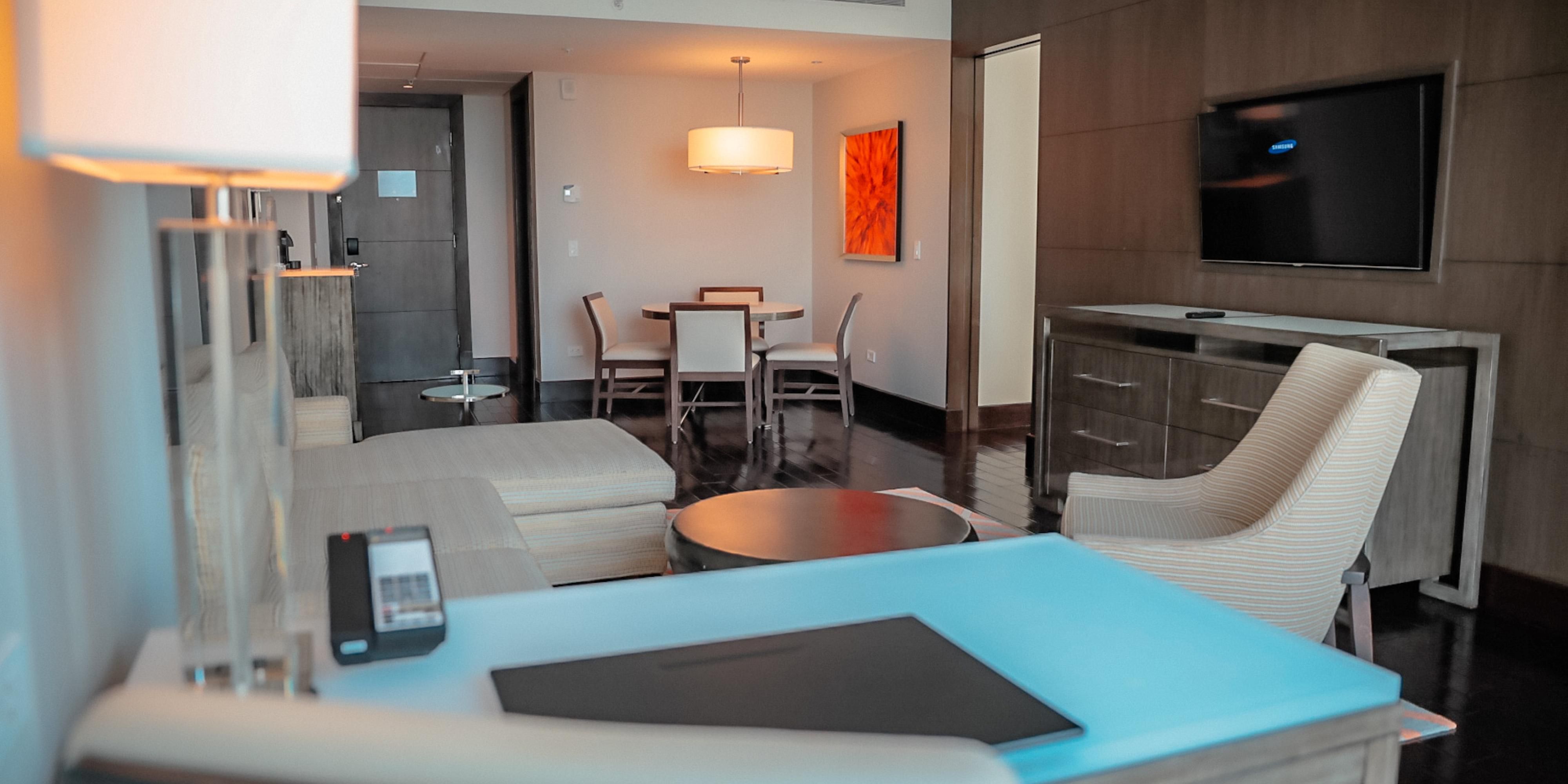 Enjoy extra space with a separate workspace in our Suites.
