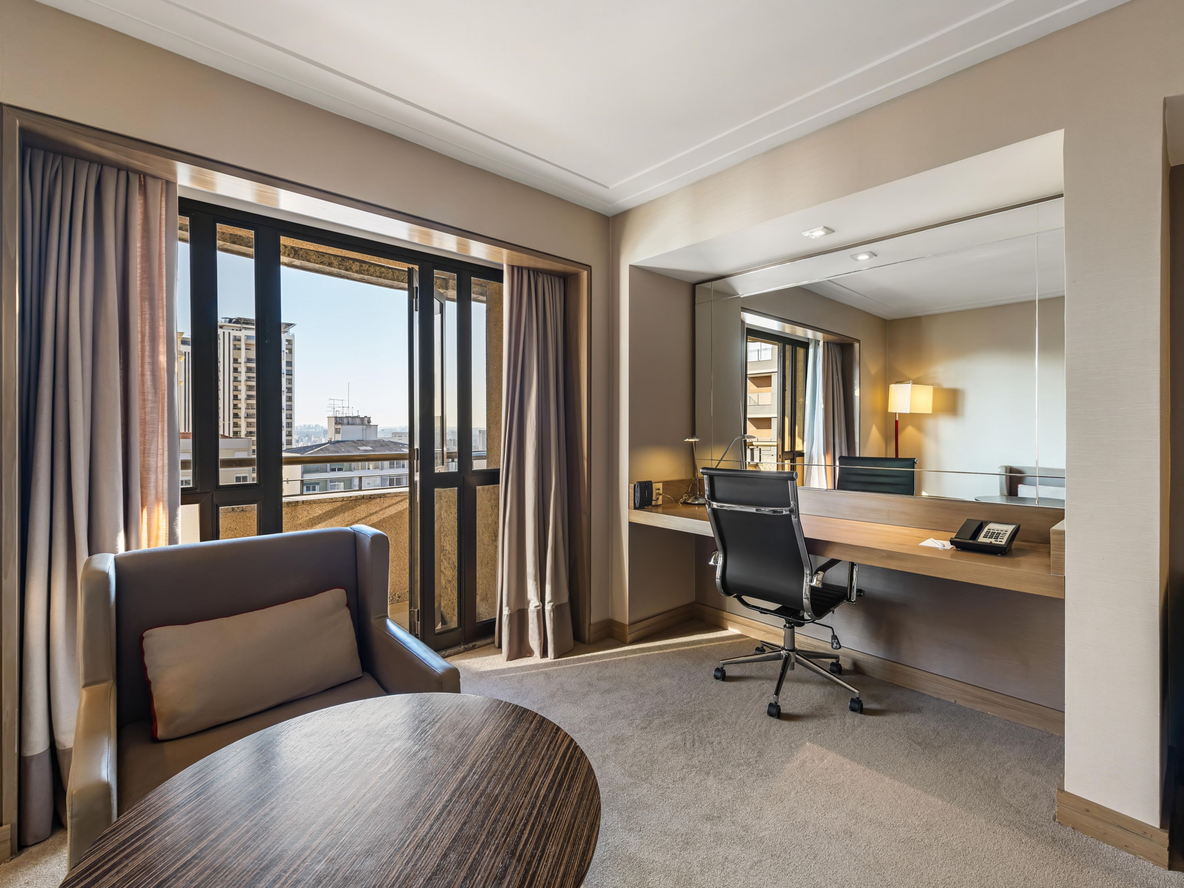 Enjoy extra space with a separate workspace in our guest rooms.