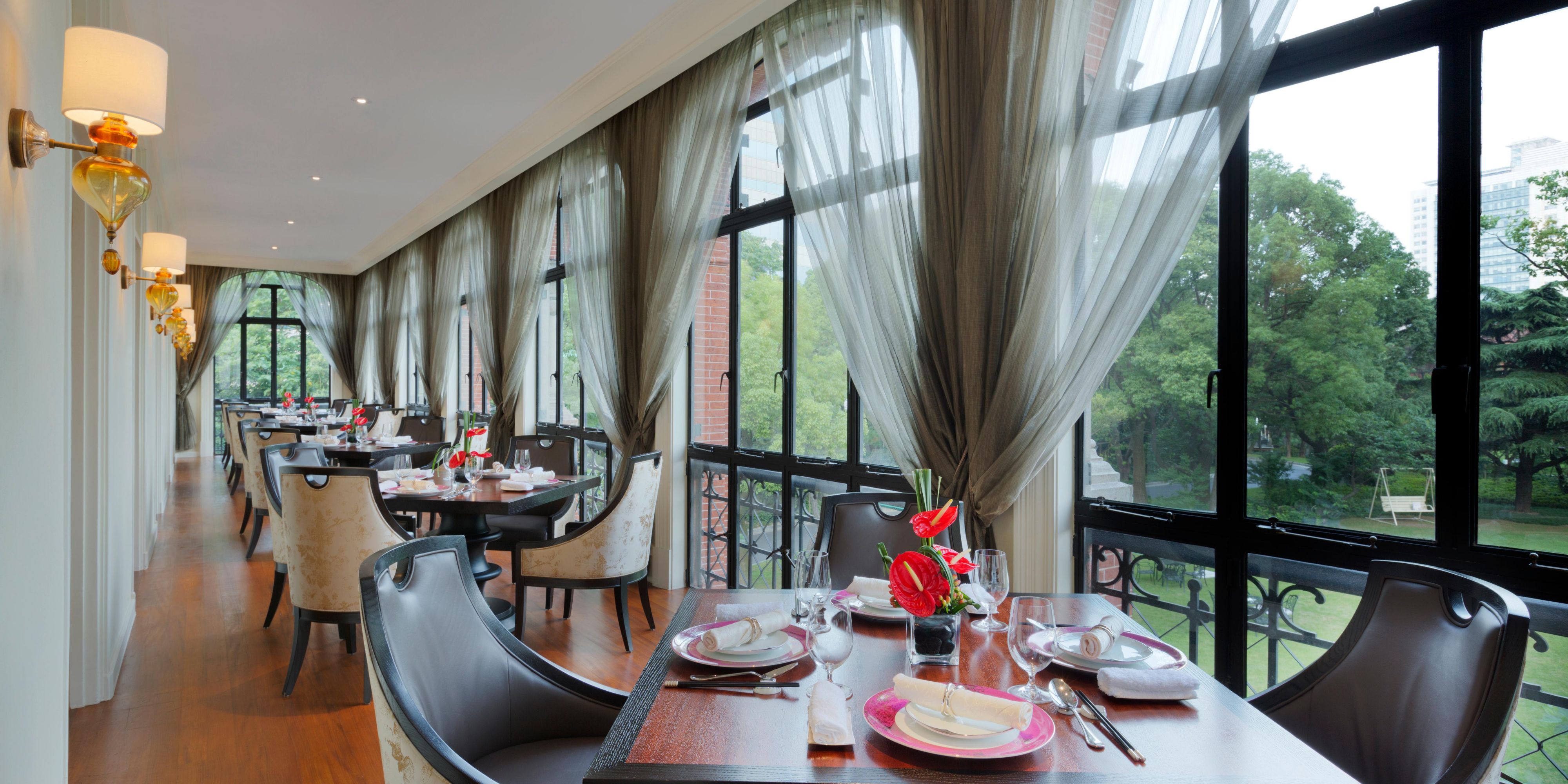 Xin Yuan Lou was built in 1930 and is now a three-story Chinese restaurant providing Cantonese and Shanghainese delicacies. The main dining room plus eight private dining suites up to 35 guests. Themed private dining suites feature distinctive designs which highlight Chinese culture.
