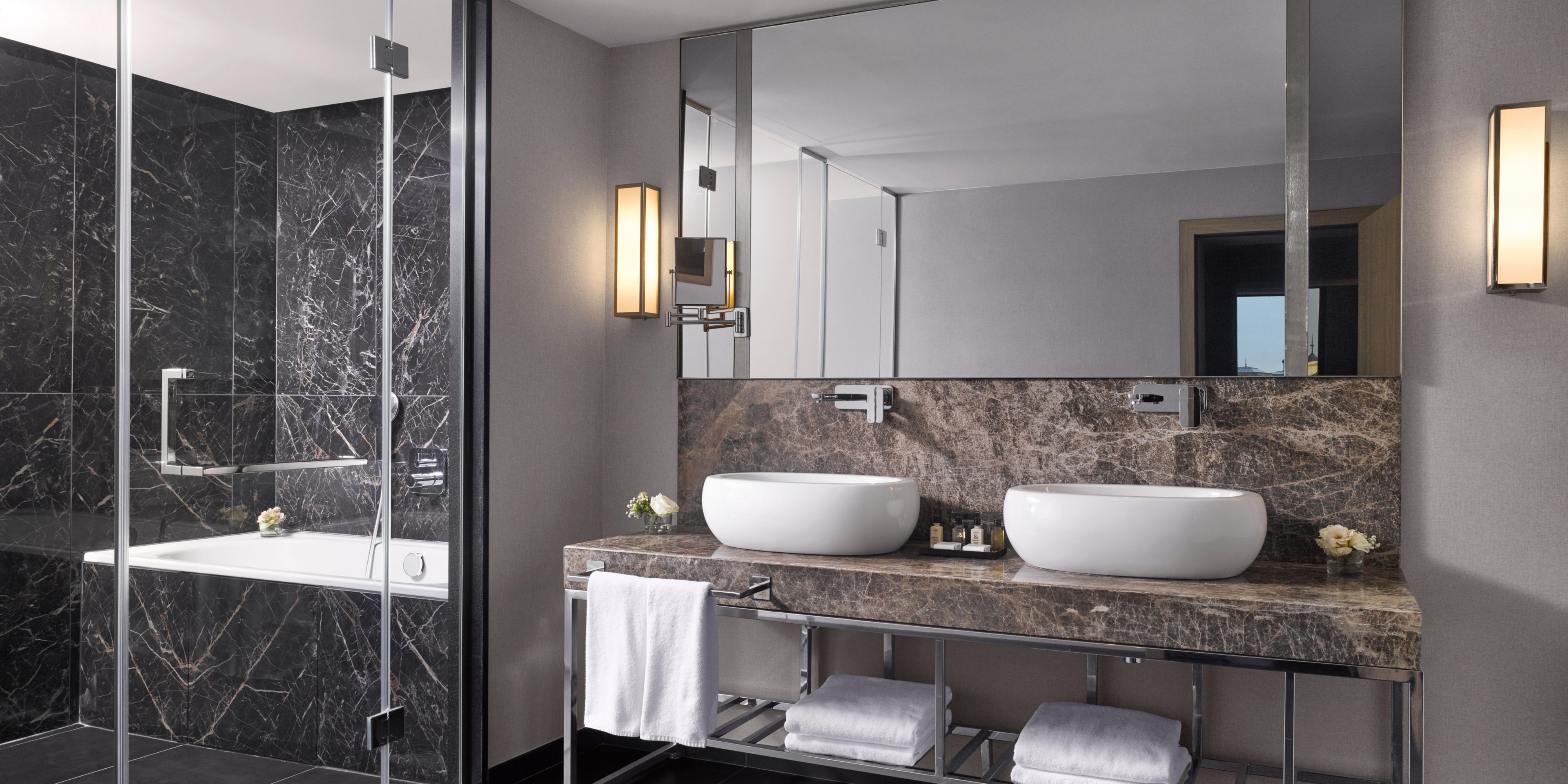 Spacious bathroom with luxury cosmetics for un ultimate comfort.