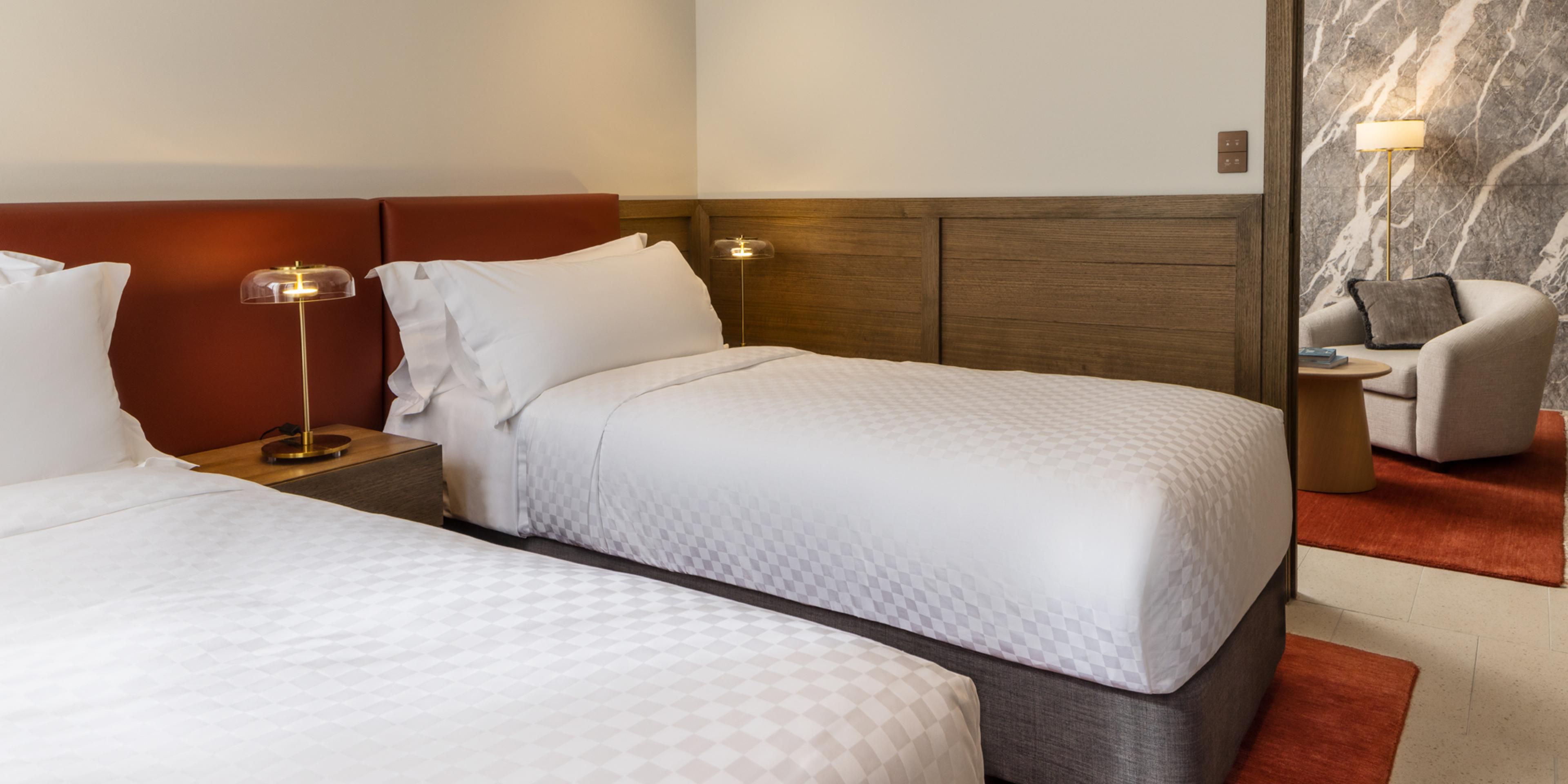 Heritage Elegance: Twin Beds in a Suite Steeped in History