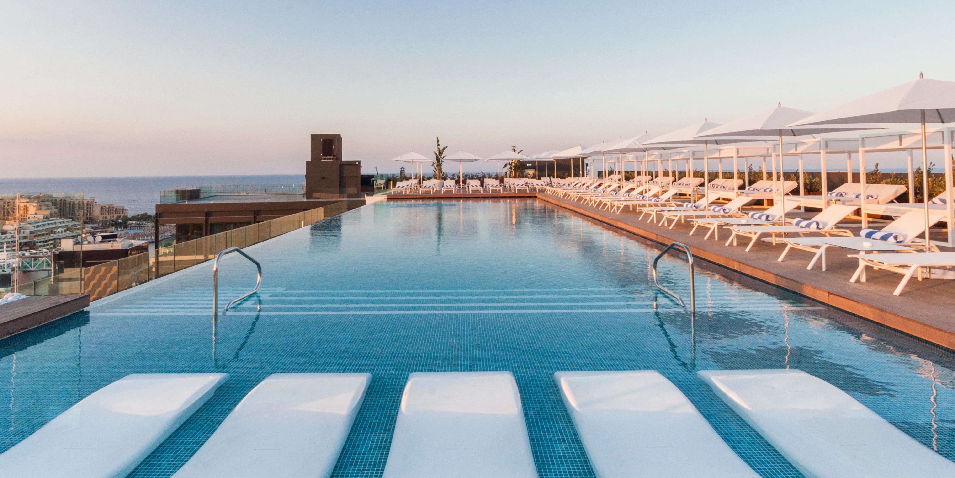 An unforgettable experience awaits at the SKYBEACH Infinity Pool, located on the 19th floor overlooking Malta and the Mediterranean Sea. Enjoy a private bar and dining area as you take a dip in the spectacular infinity pool, with complimentary access for Suite Bookers.