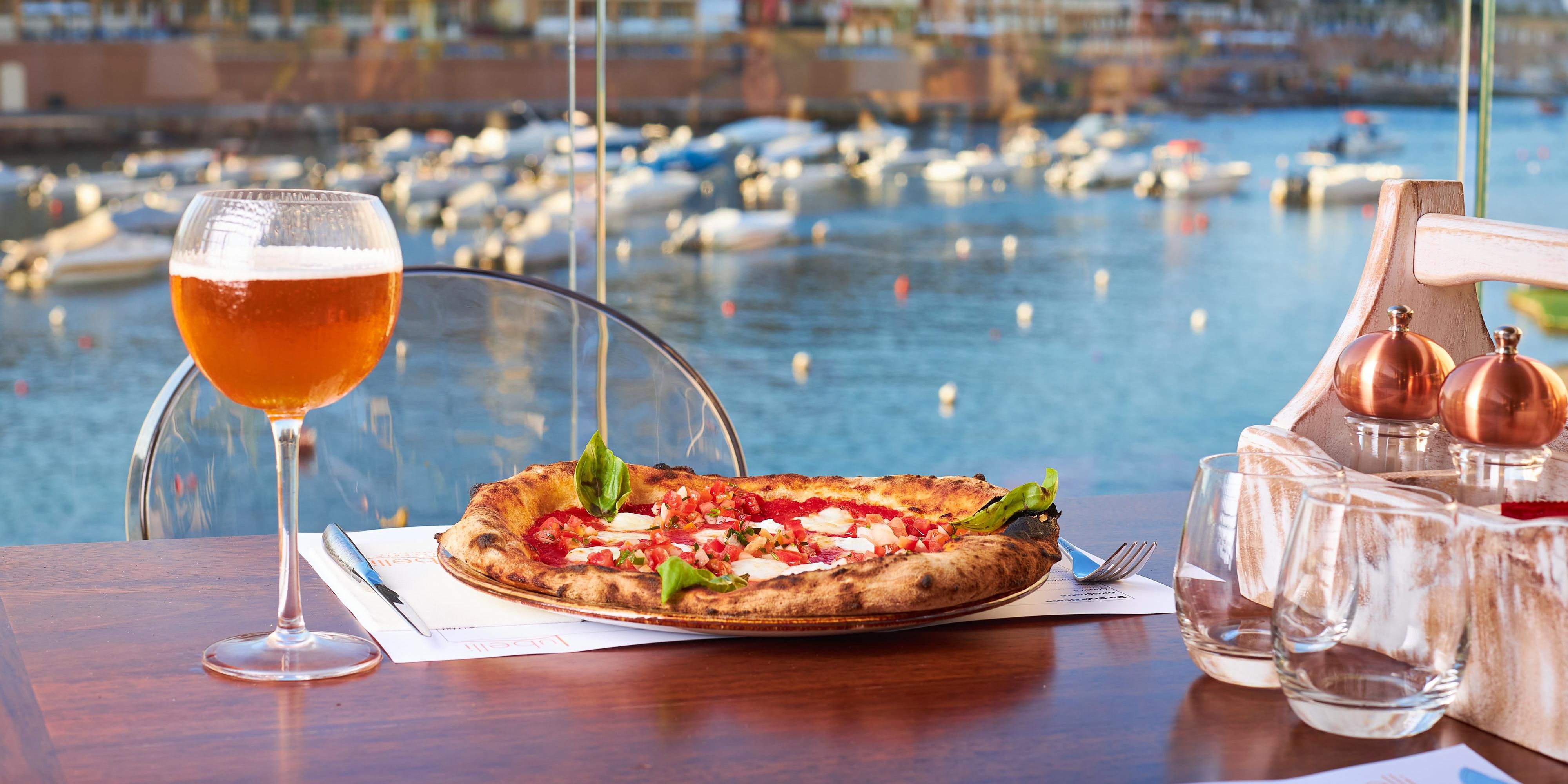 Enjoy the taste of Italy at Lubelli Neapolitan Pizzeria located on St. George's Bay. With a wood fired oven and panoramic sea view, we bring you the best of authentic Italian cuisine. Come and experience the flavors of Naples with us!