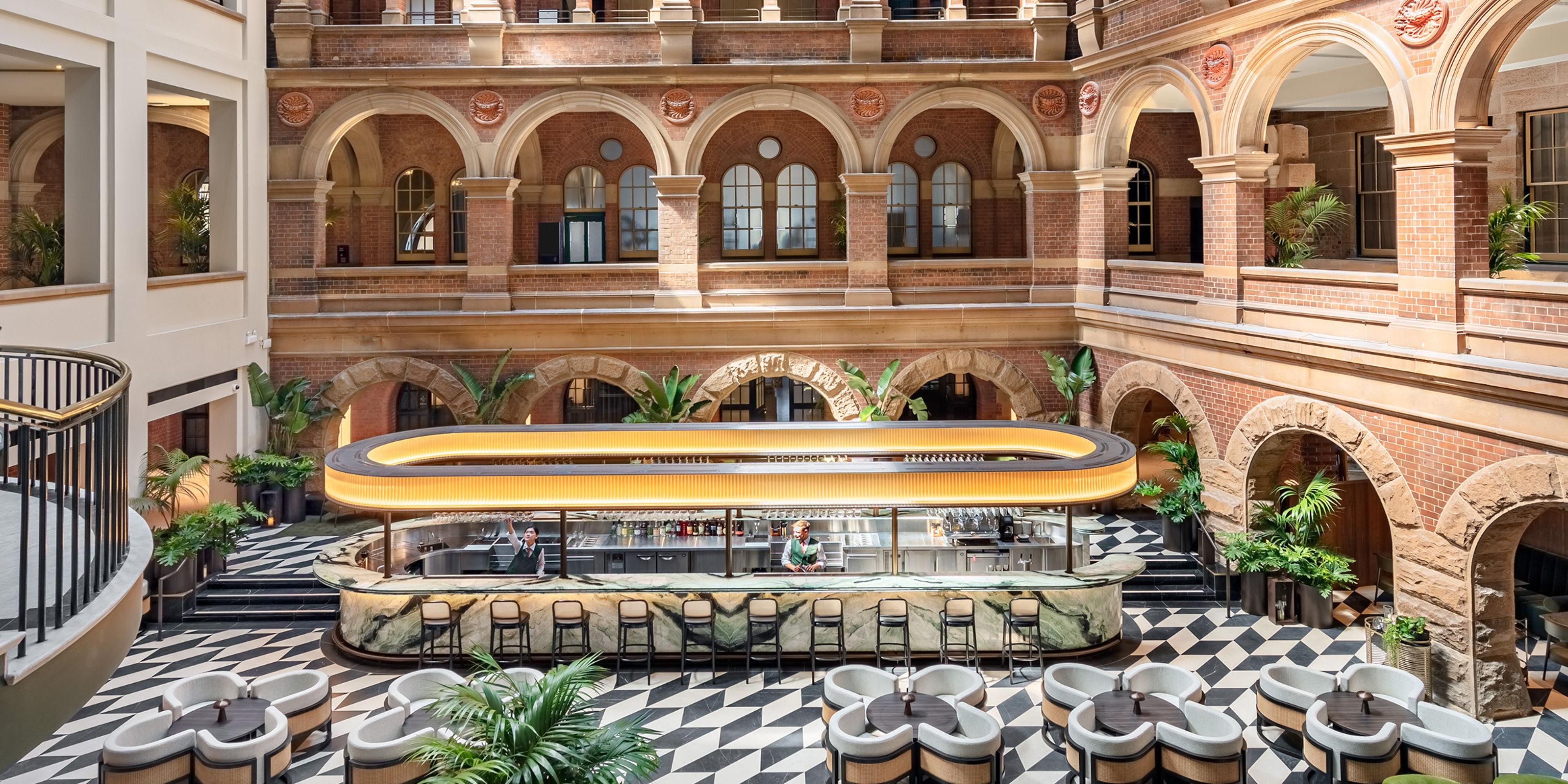 Our hotel rests within the Treasury Building of 1851, rich in 19th century heritage. This building, with its intricate architectural façade, was the first purpose-built government office in Sydney. Our building houses the oldest operating lift in the Southern Hemisphere and the first vault in Australia.