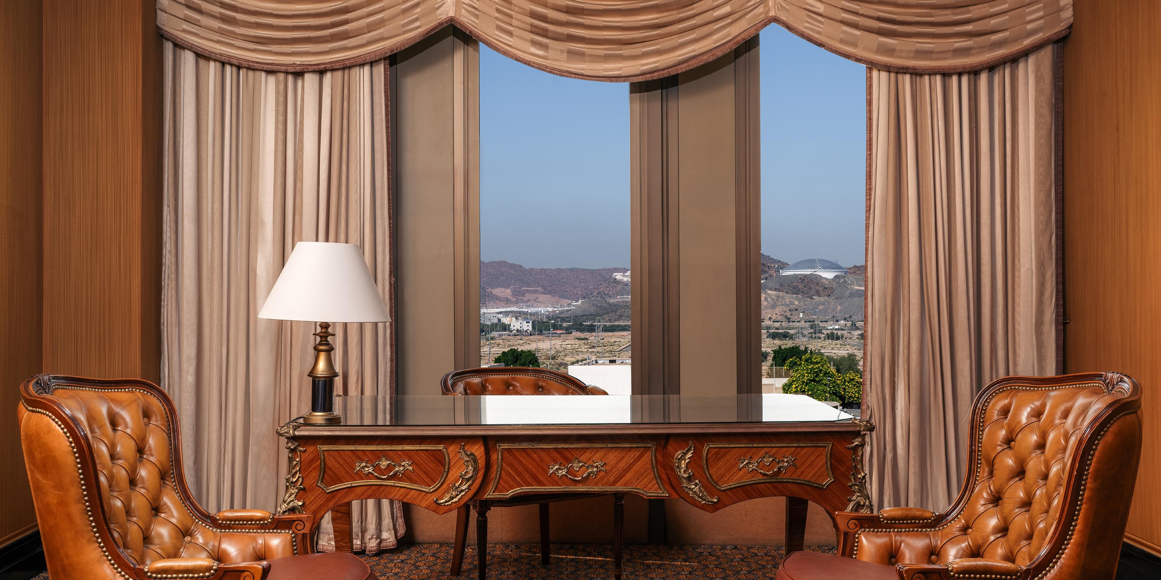 Work in elegance at the desk in the Royal Suite bedroom