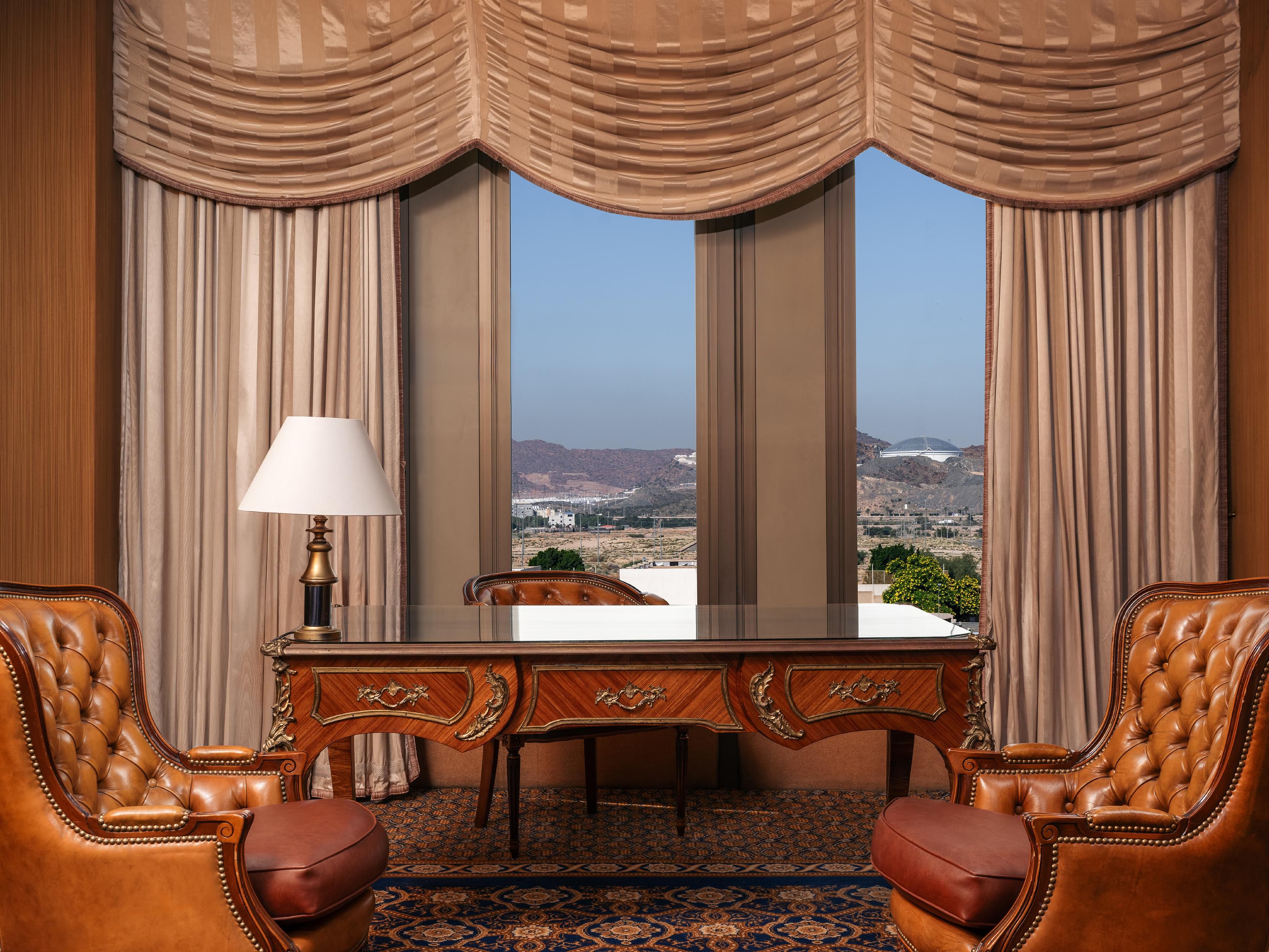 Work in elegance at the desk in the Royal Suite bedroom