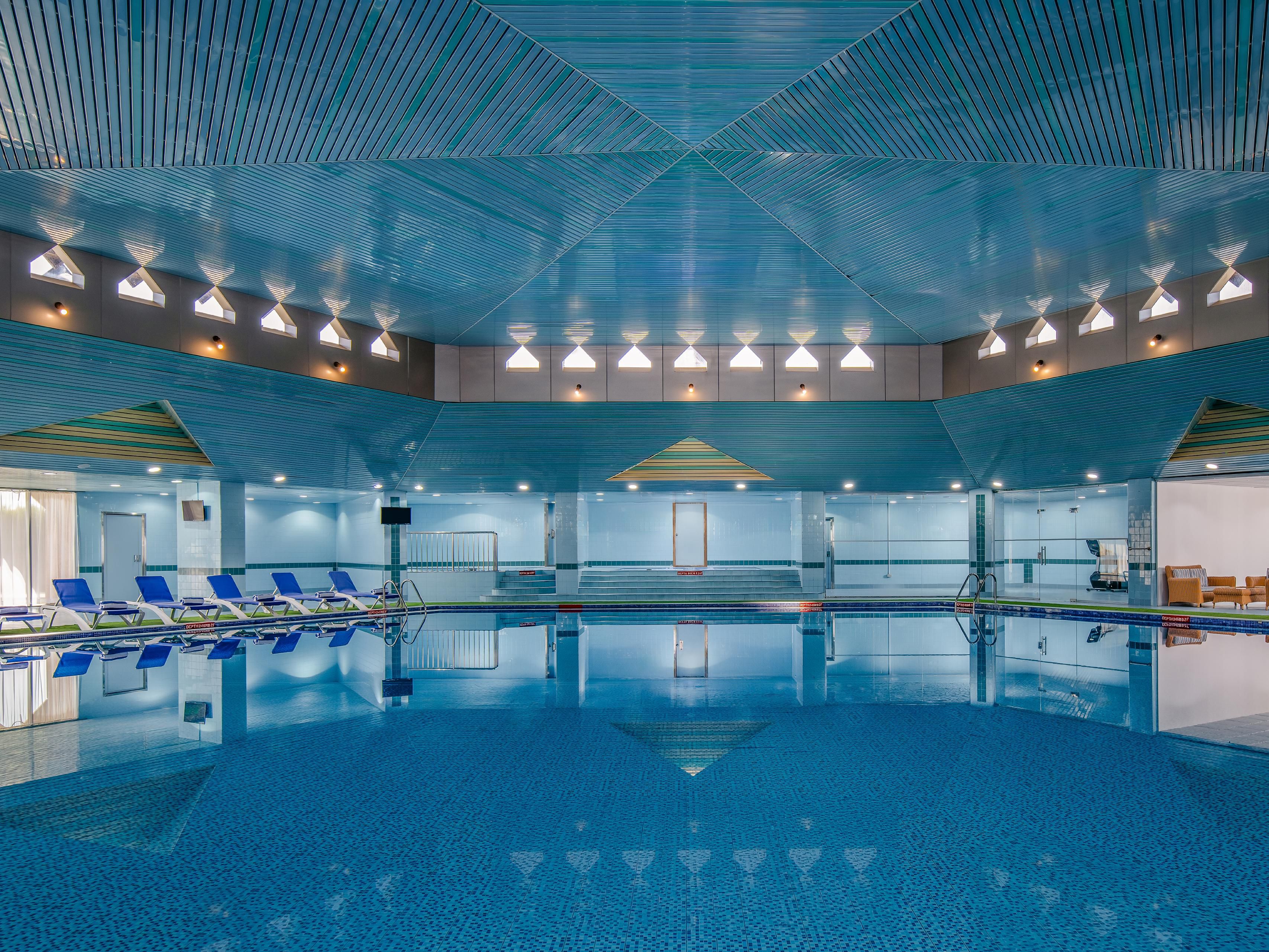 Unwind in the serene indoor pool at InterContinental Taif