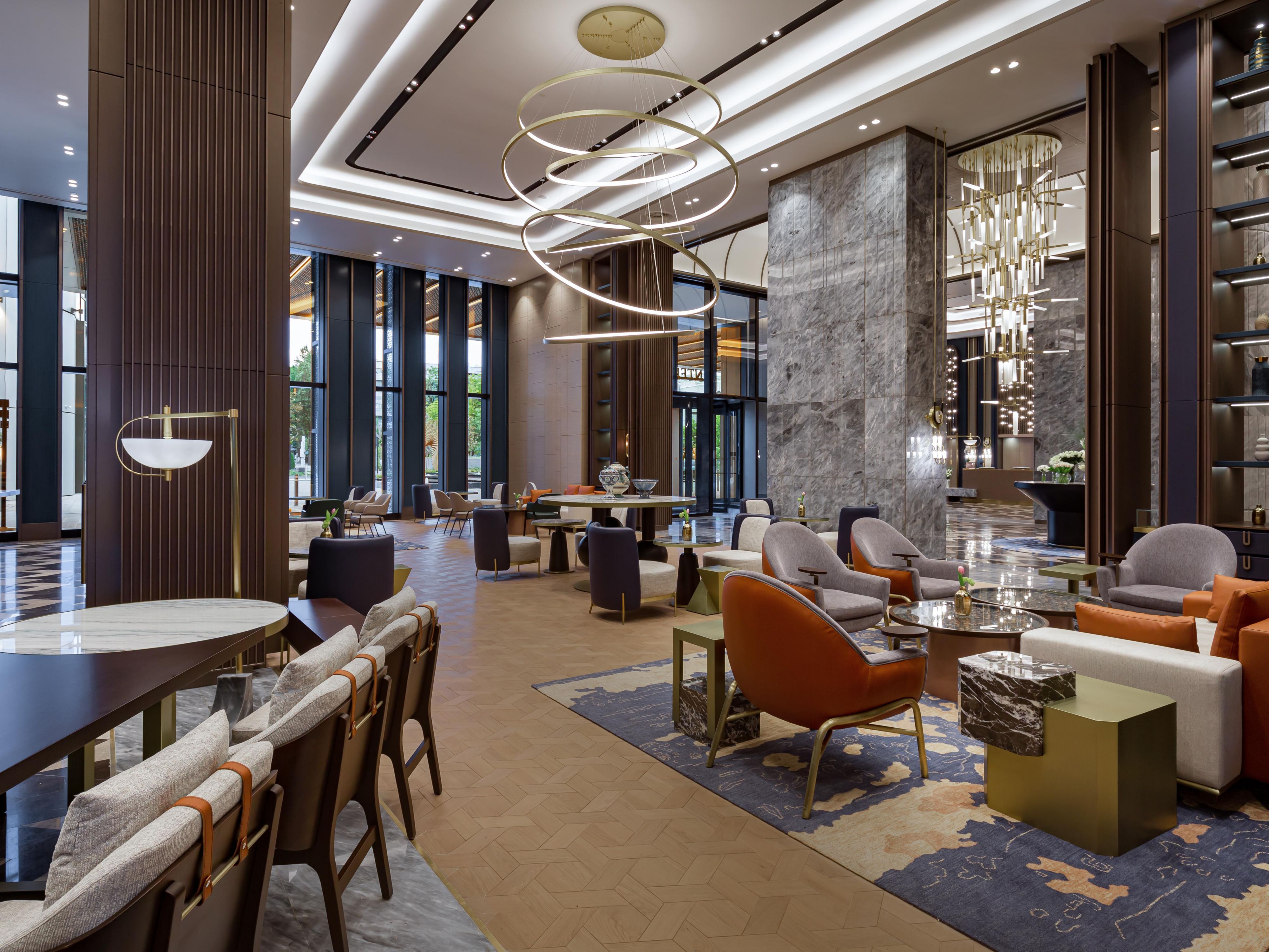 The spacious lobby of the hotel features Chach Lobby Bar.
