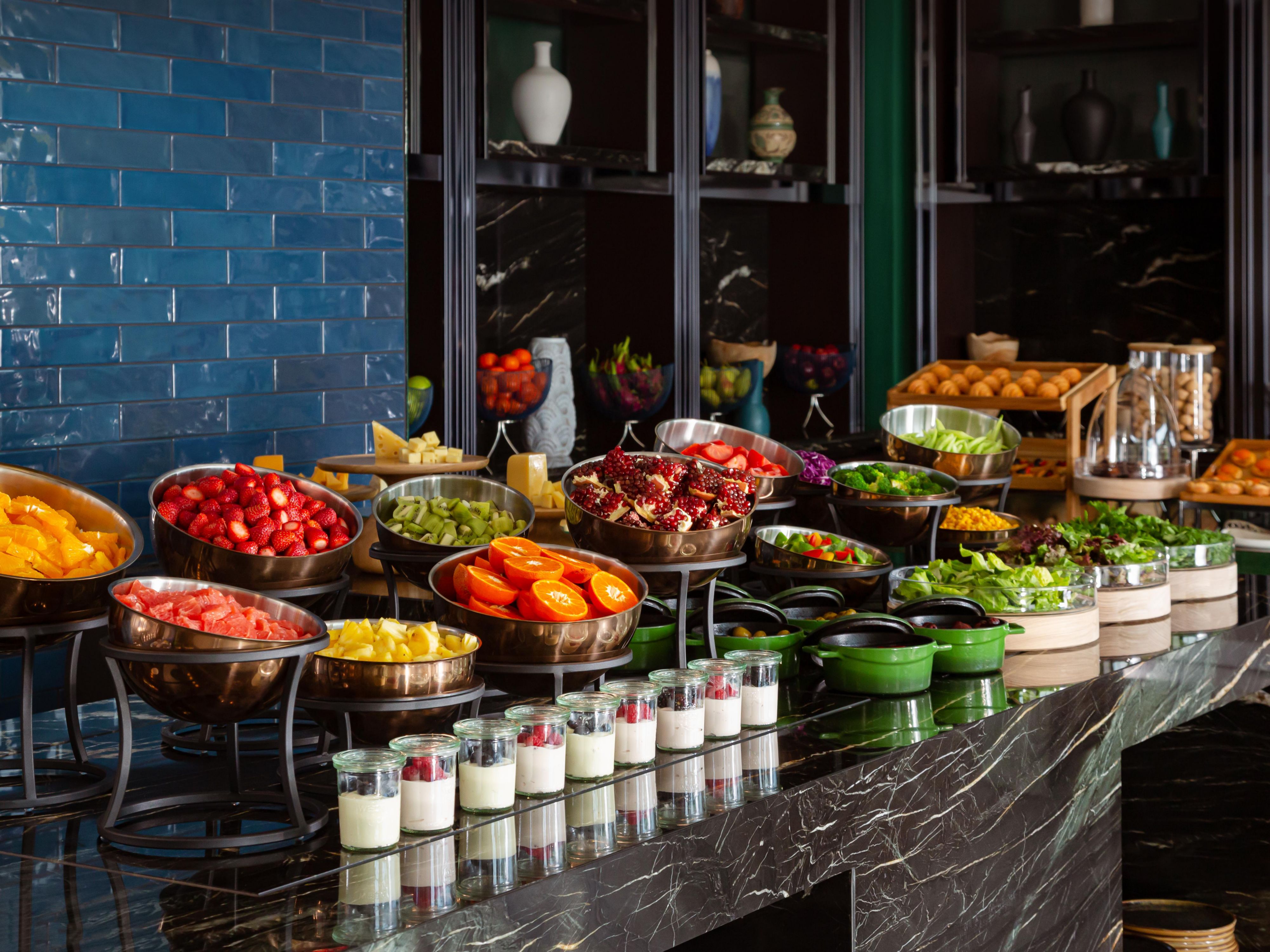 An array of cold cuts, cheeses, fruits and many more await you.