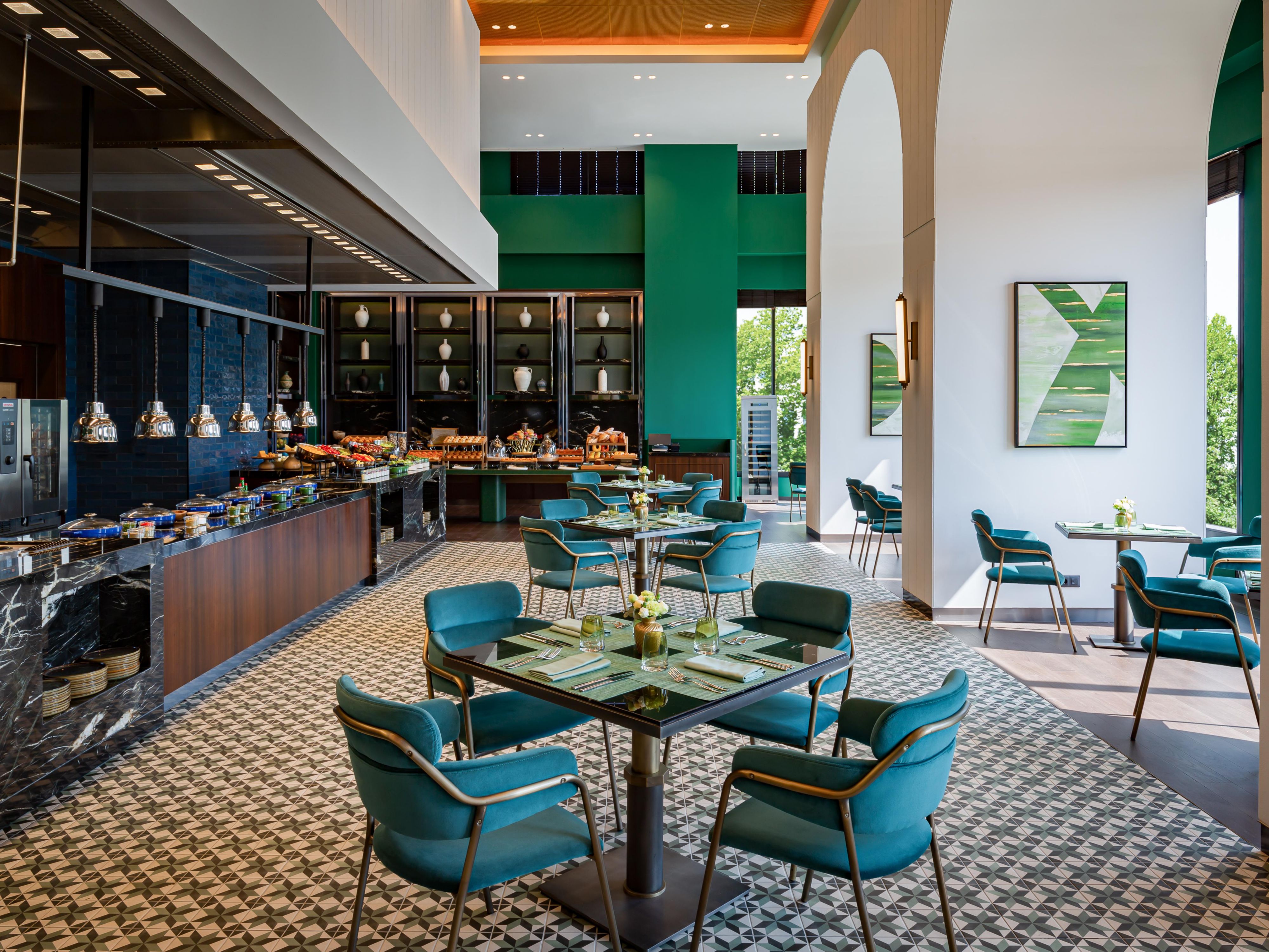 The open kitchen in No'mad adds to the unique and cozy ambience.