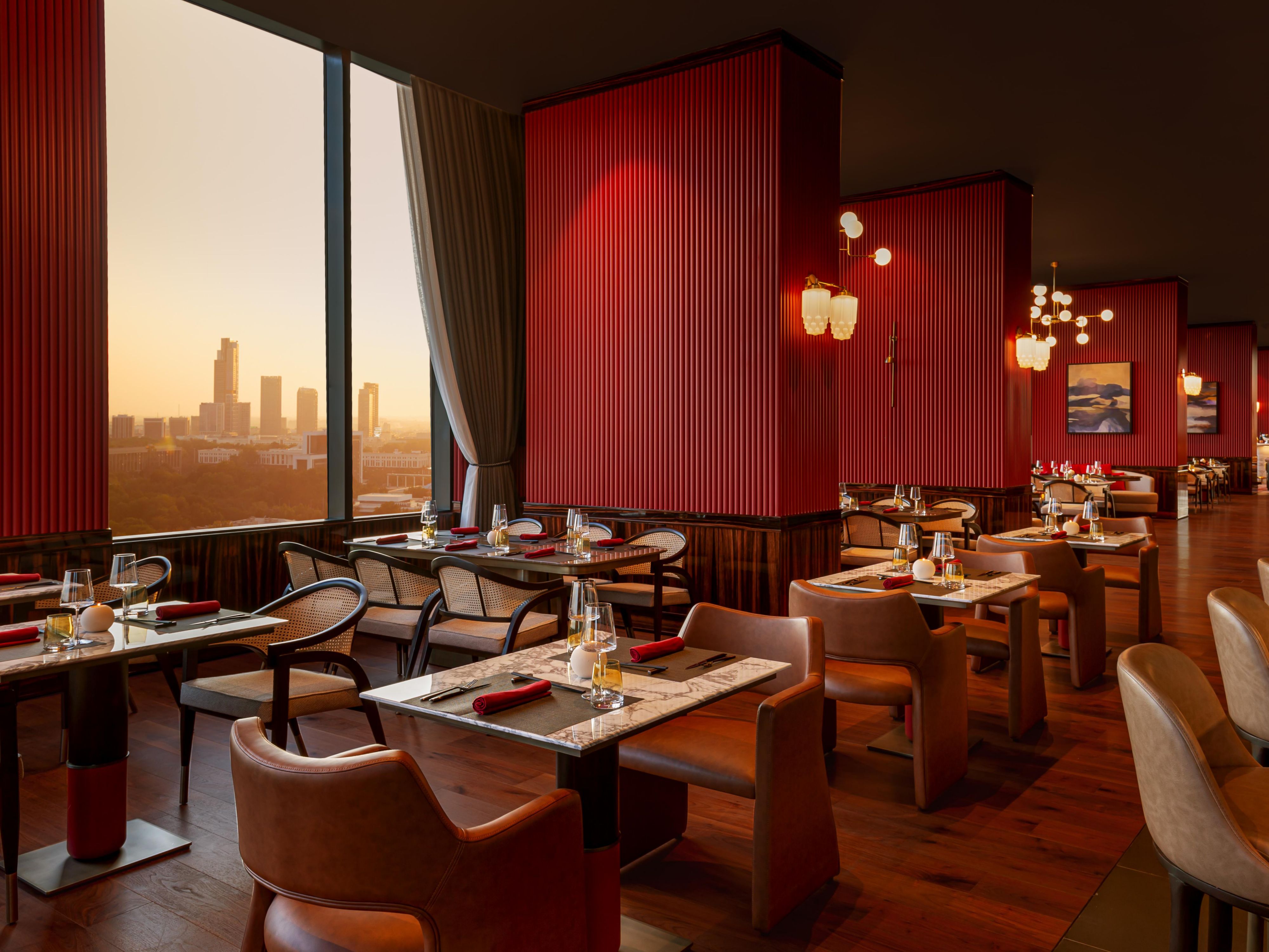 A deep red color creates the unique feel of the restaurant.
