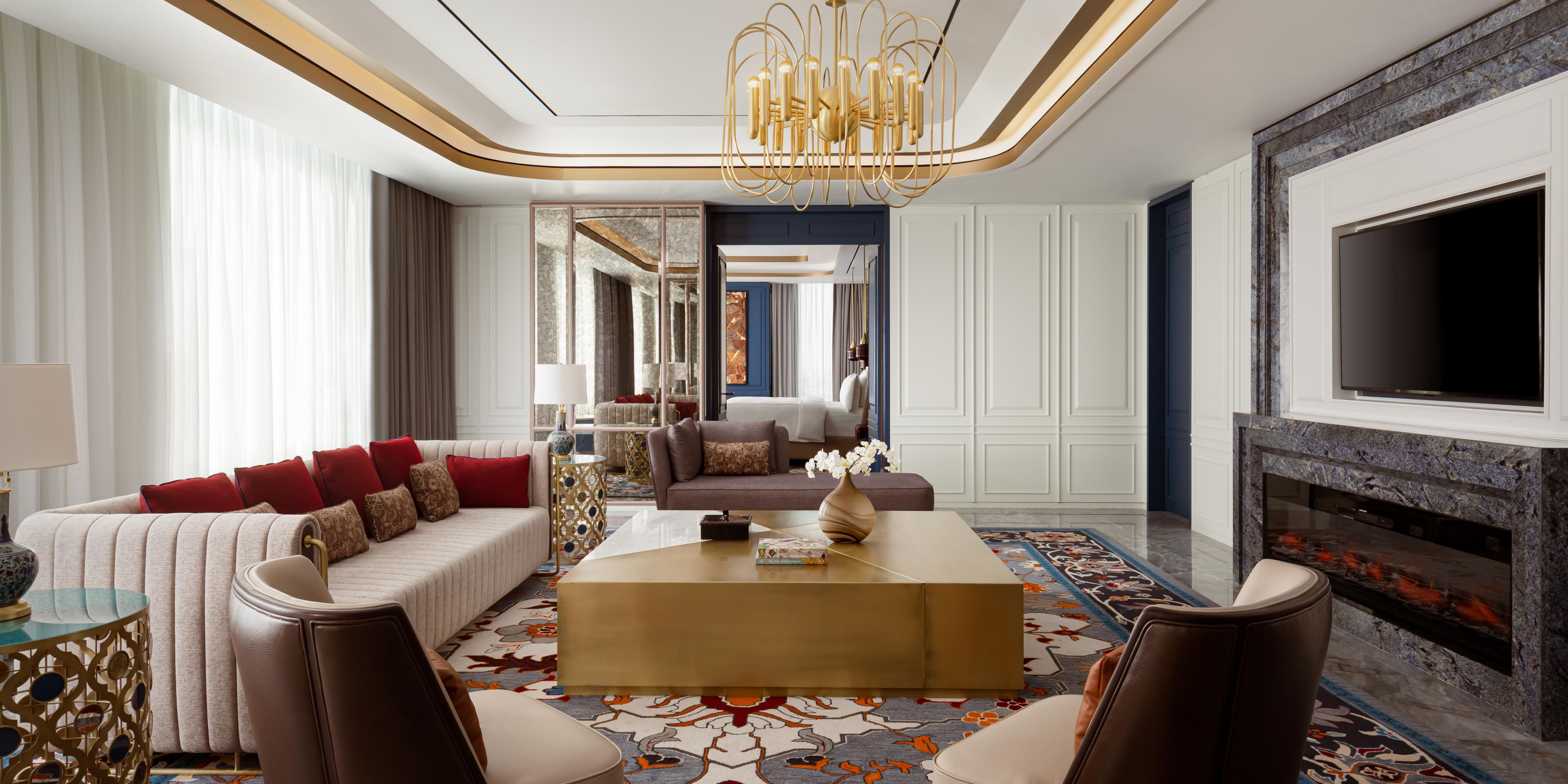 The blue, burgundy and gold interior of Presidential Suite.