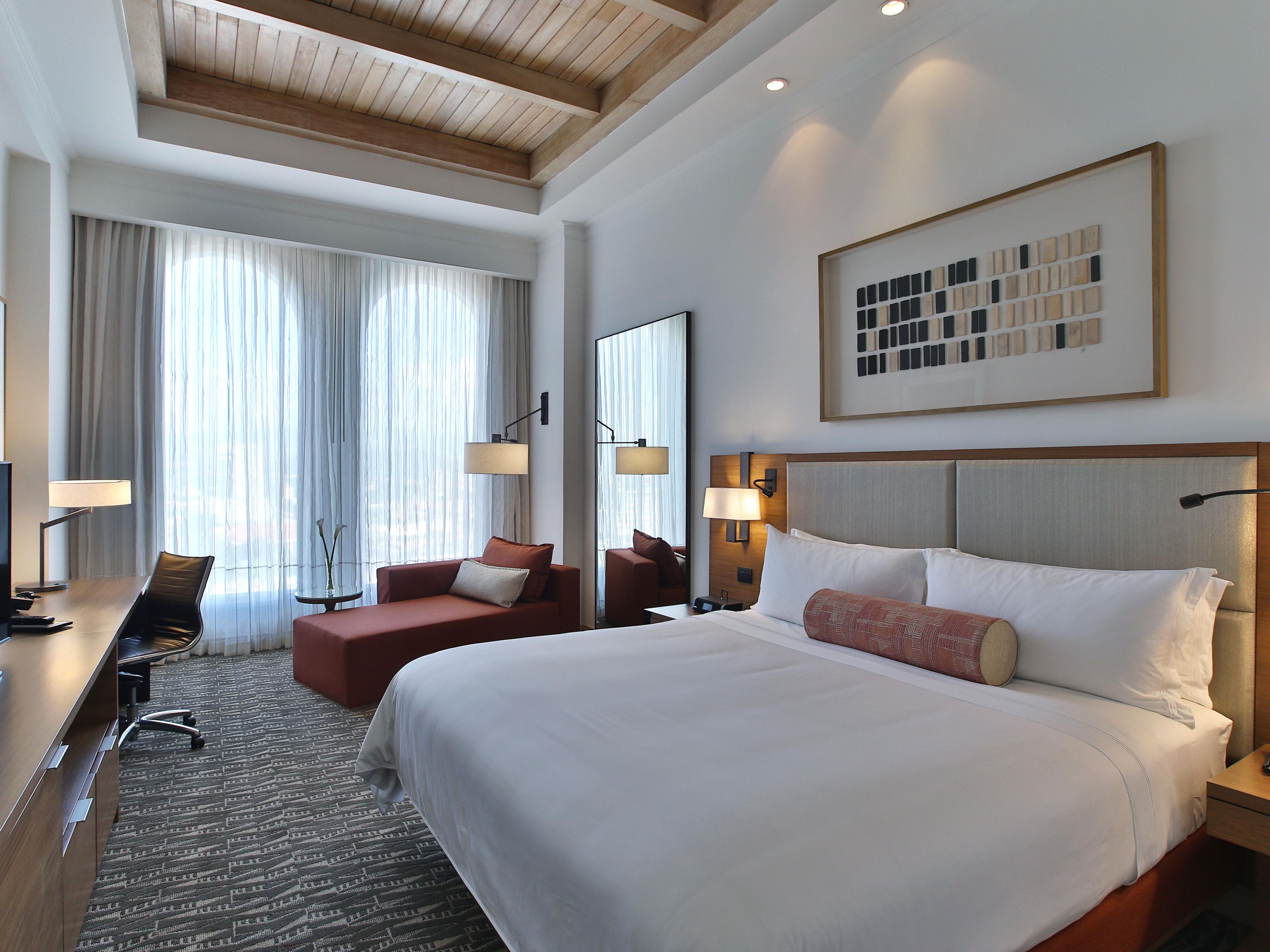 Relax in your spacious room with space for working and lounging.