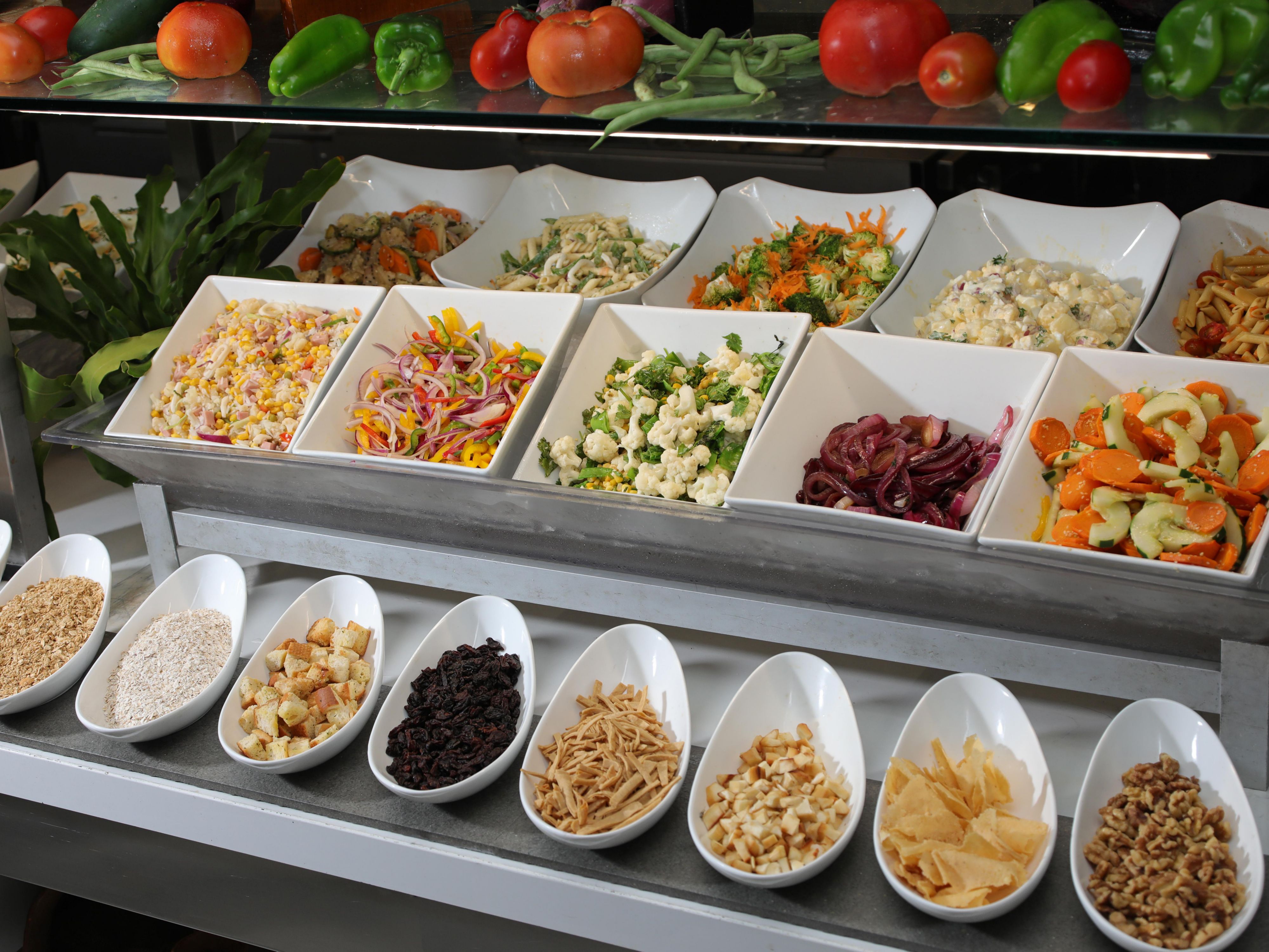 Create your own salad with fresh ingredients at The Market.