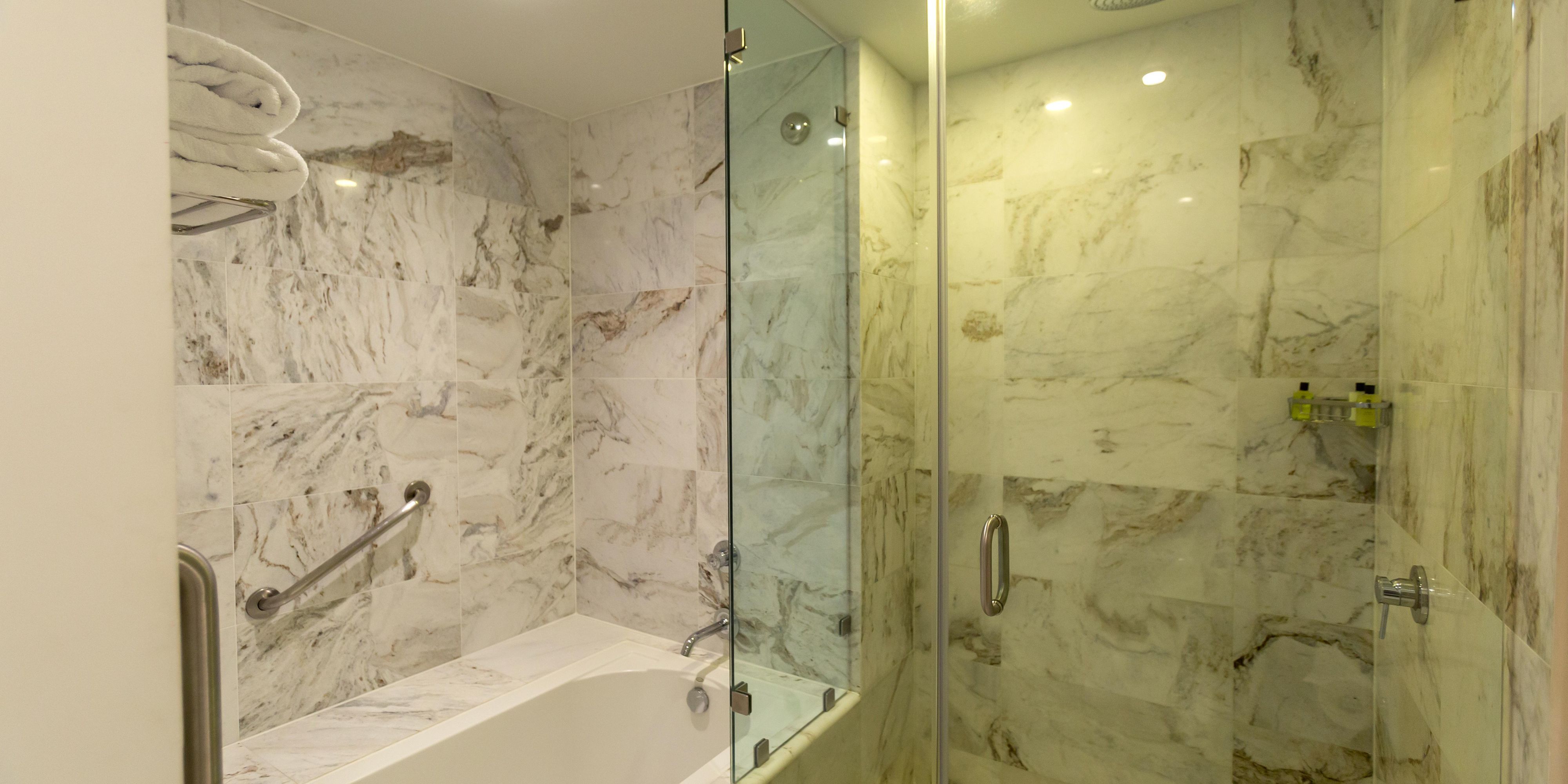 Our spacious guest bathroom with marble finish.