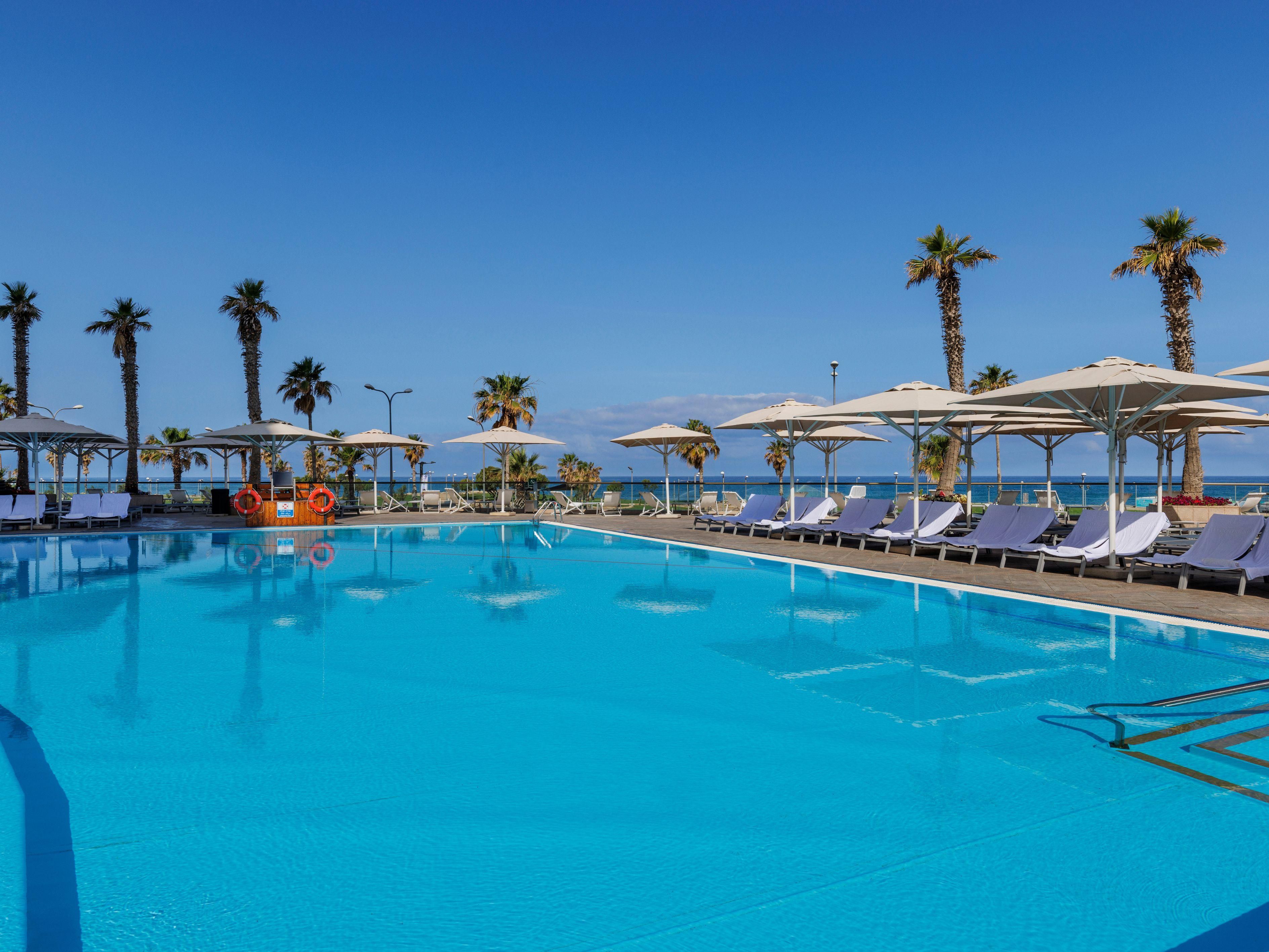 Enjoy the stunning Mediterranean Sea views from our pool