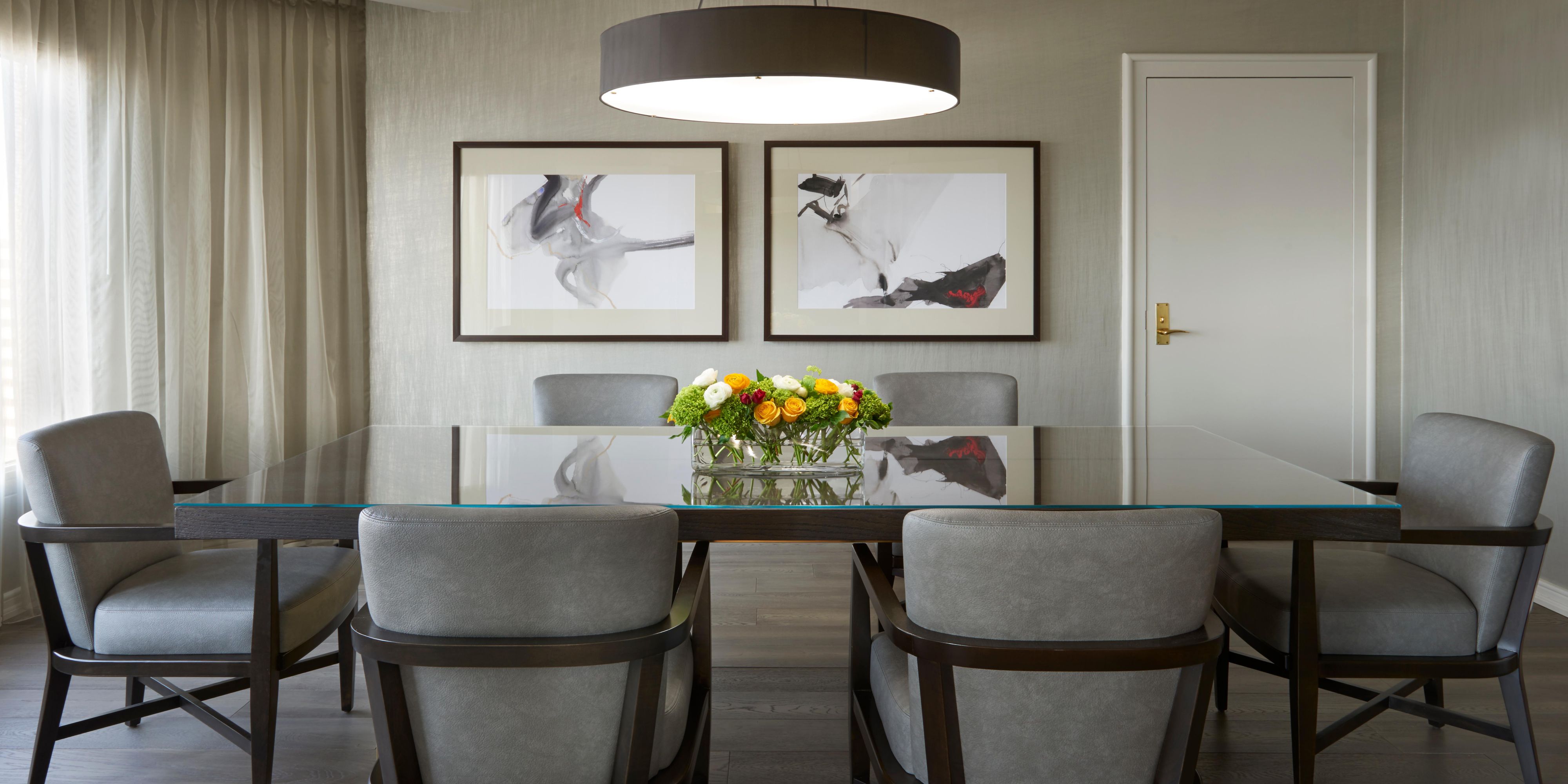 The Presidential Suite Dinning area has room for the whole family.
