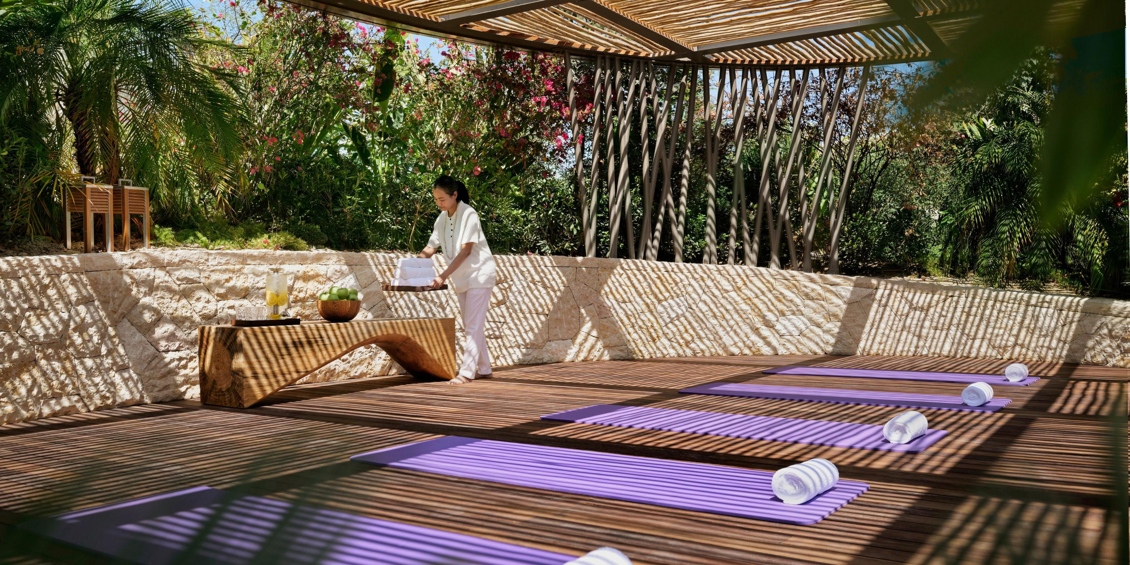 Woman relaxing at the spa with a mimosa.