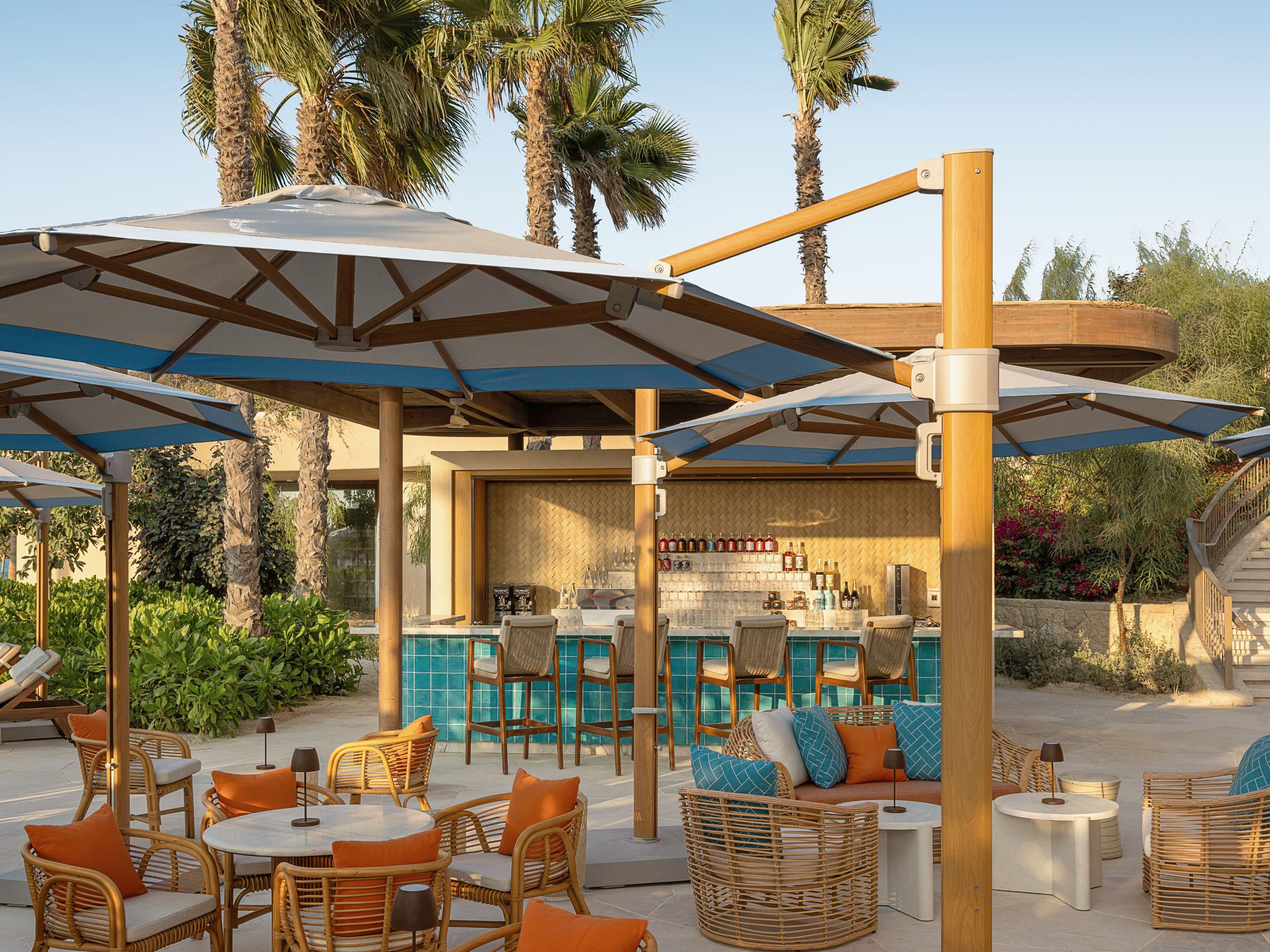 Fitness center with cardio equipment.