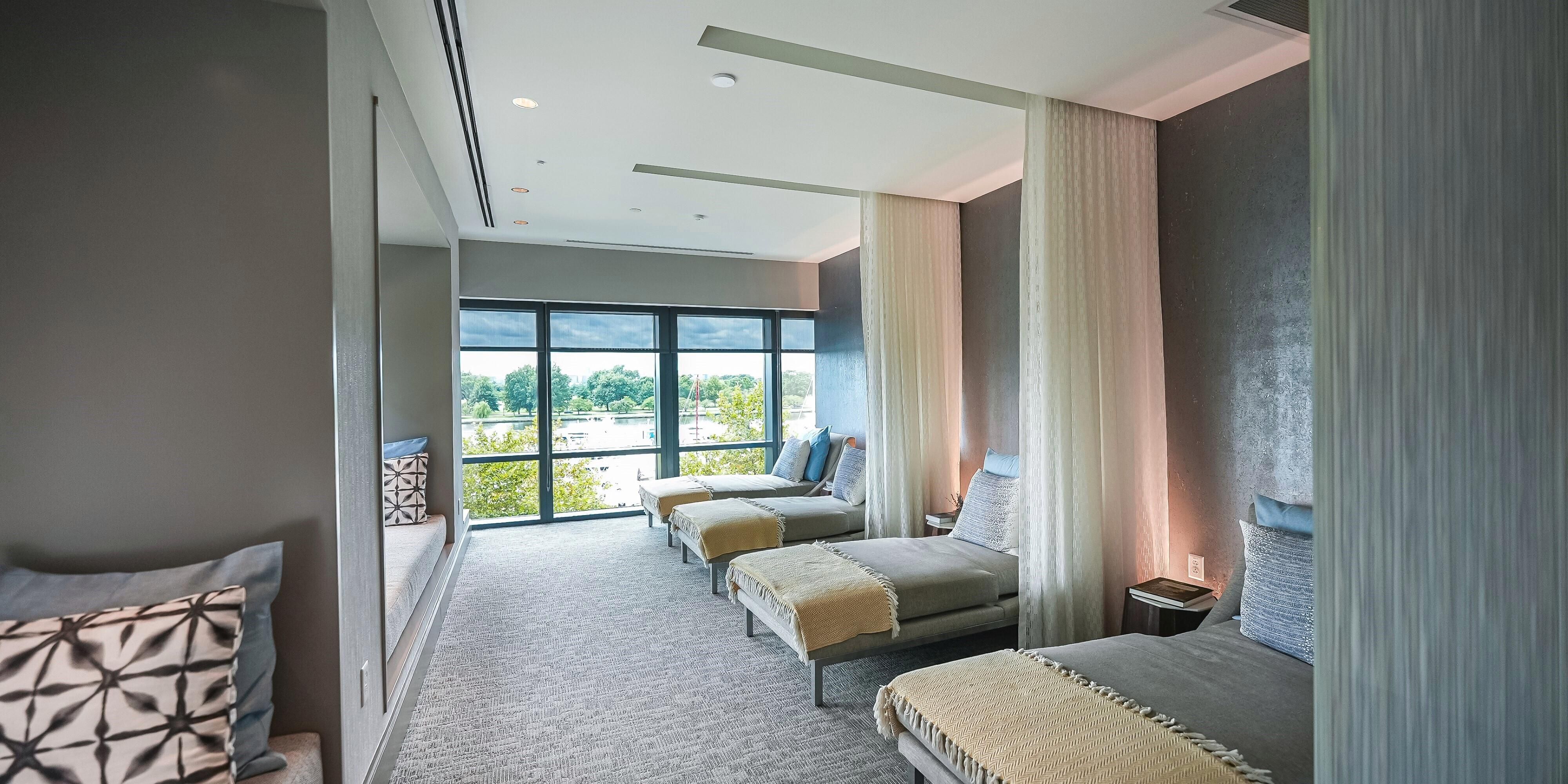 Spa seating with a waterfront view at The Spa at The Wharf.