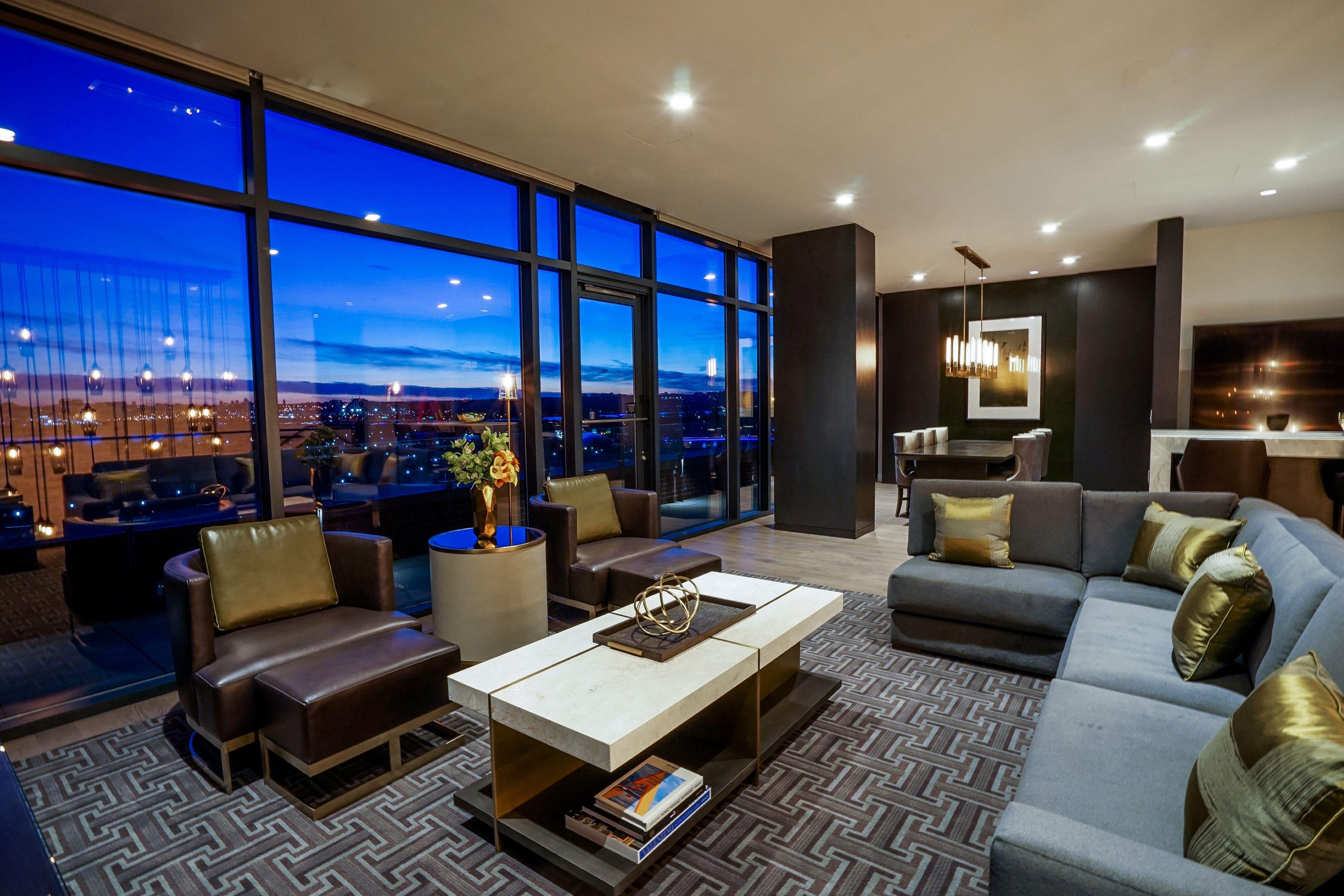 The Constellation Suite living area during evening.