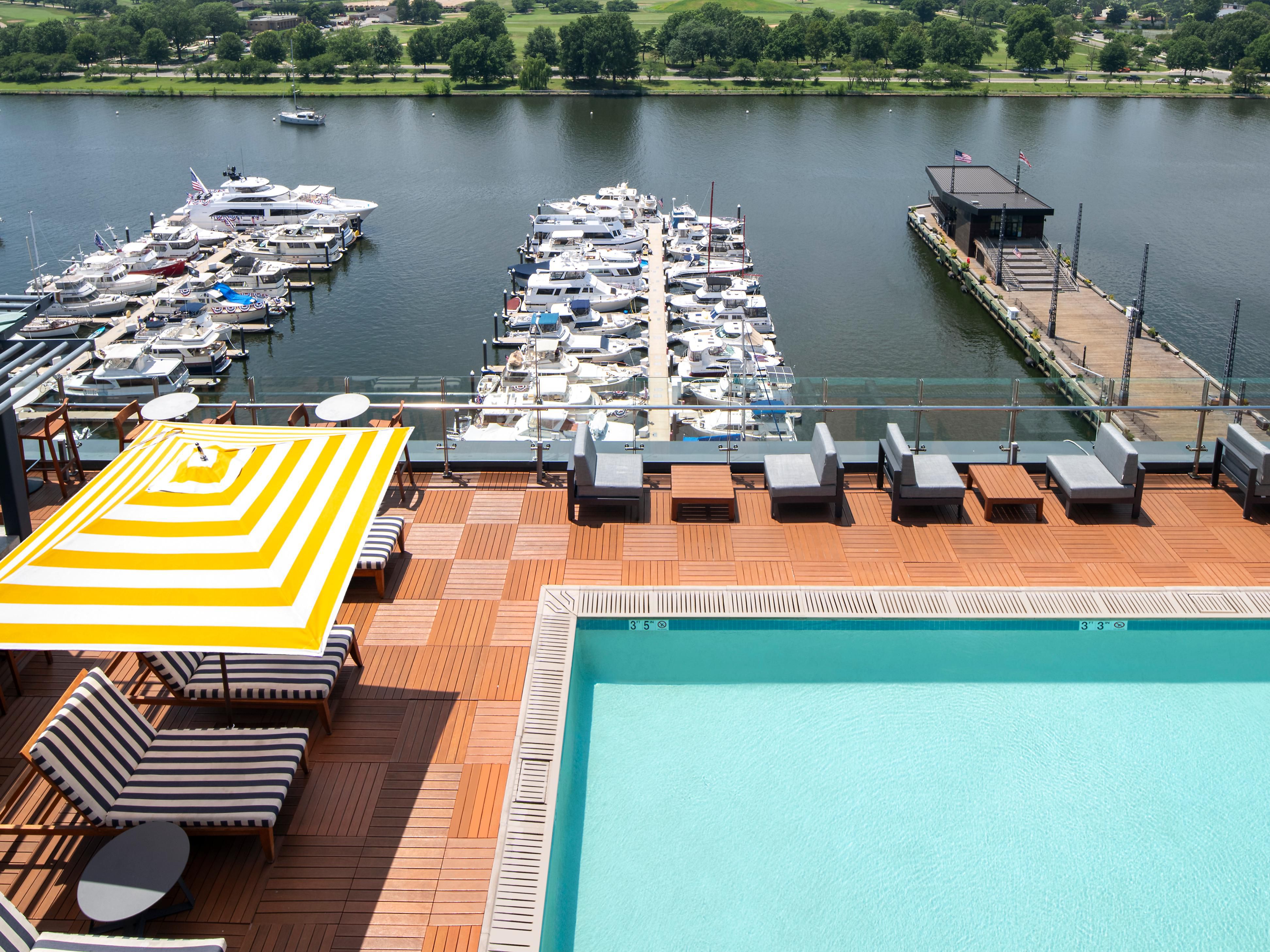 Rooftop pool deck overlooking the marina at The Wharf.