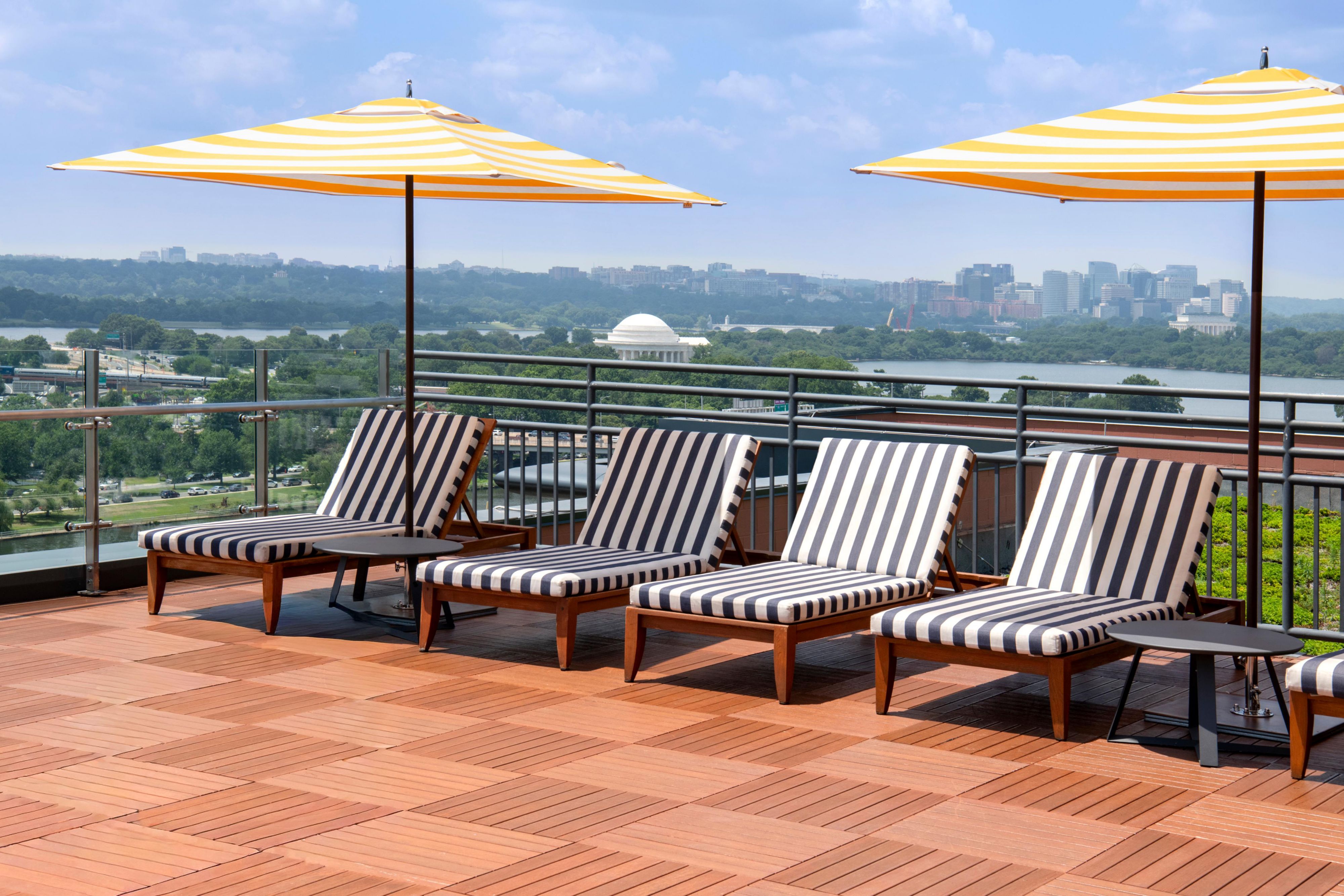 Comfortable lounge chairs on our rooftop pool deck.