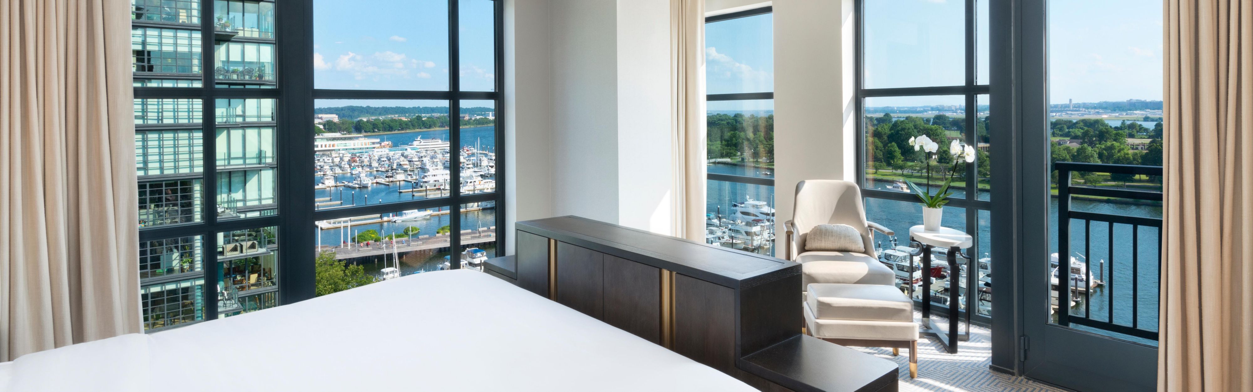 Compass Suite Bedroom with waterfront view 