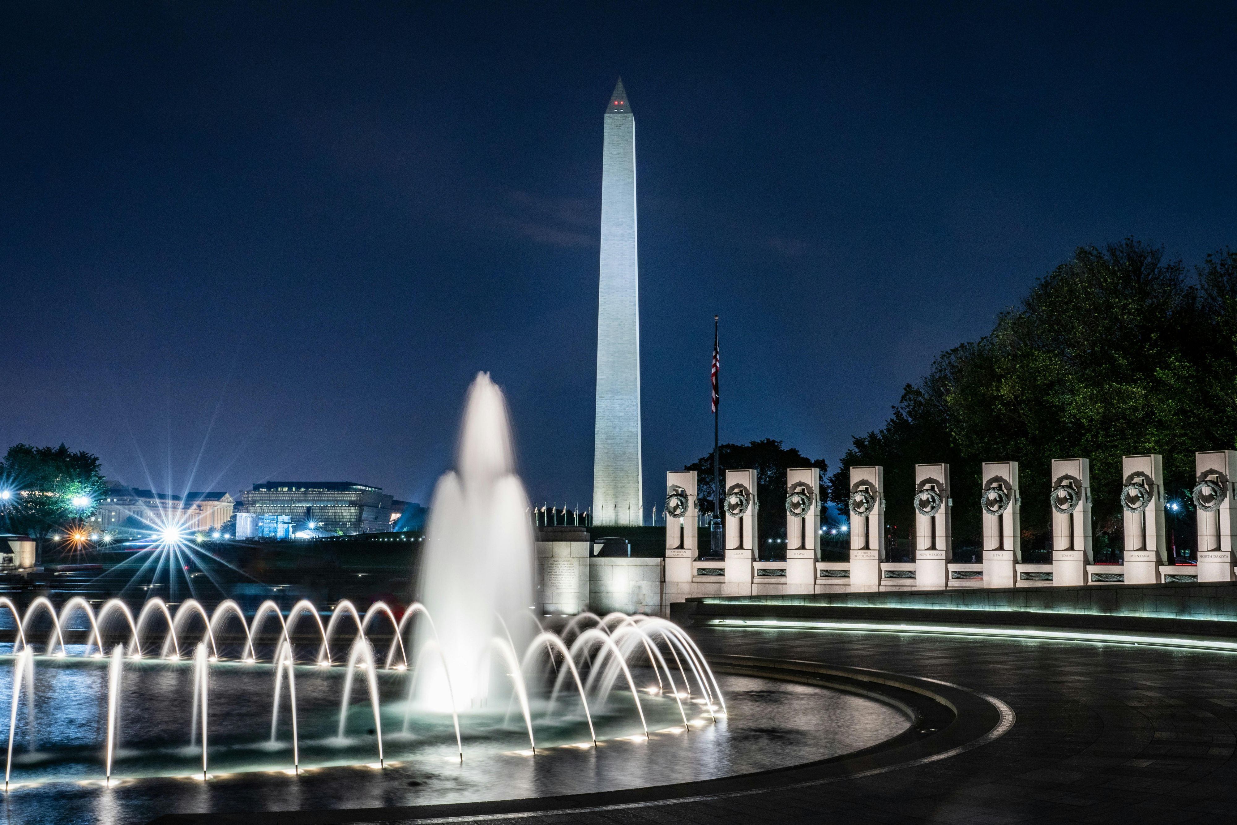Washington Memorial at night in front of fountains