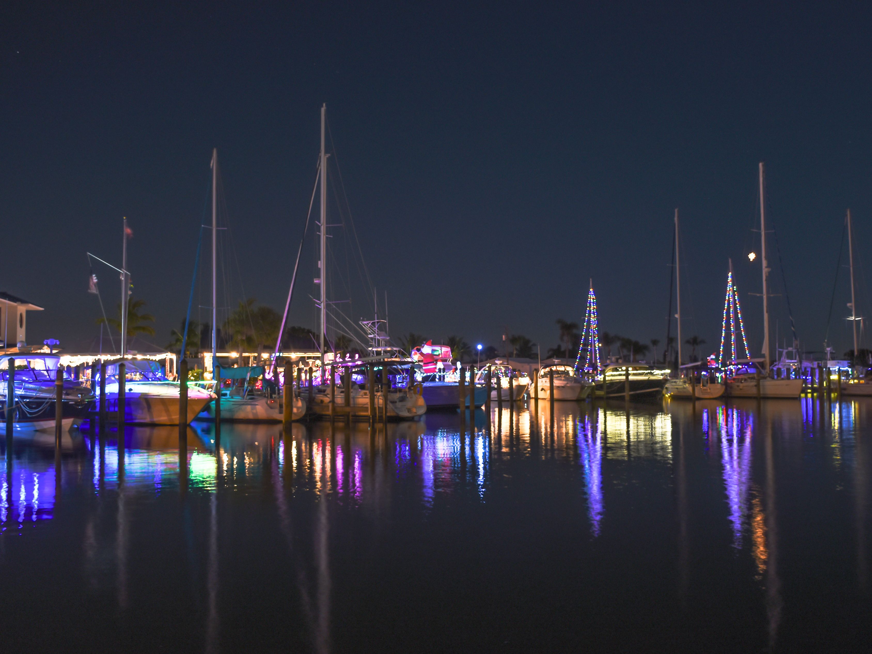 Boats decorated with Christmas lights