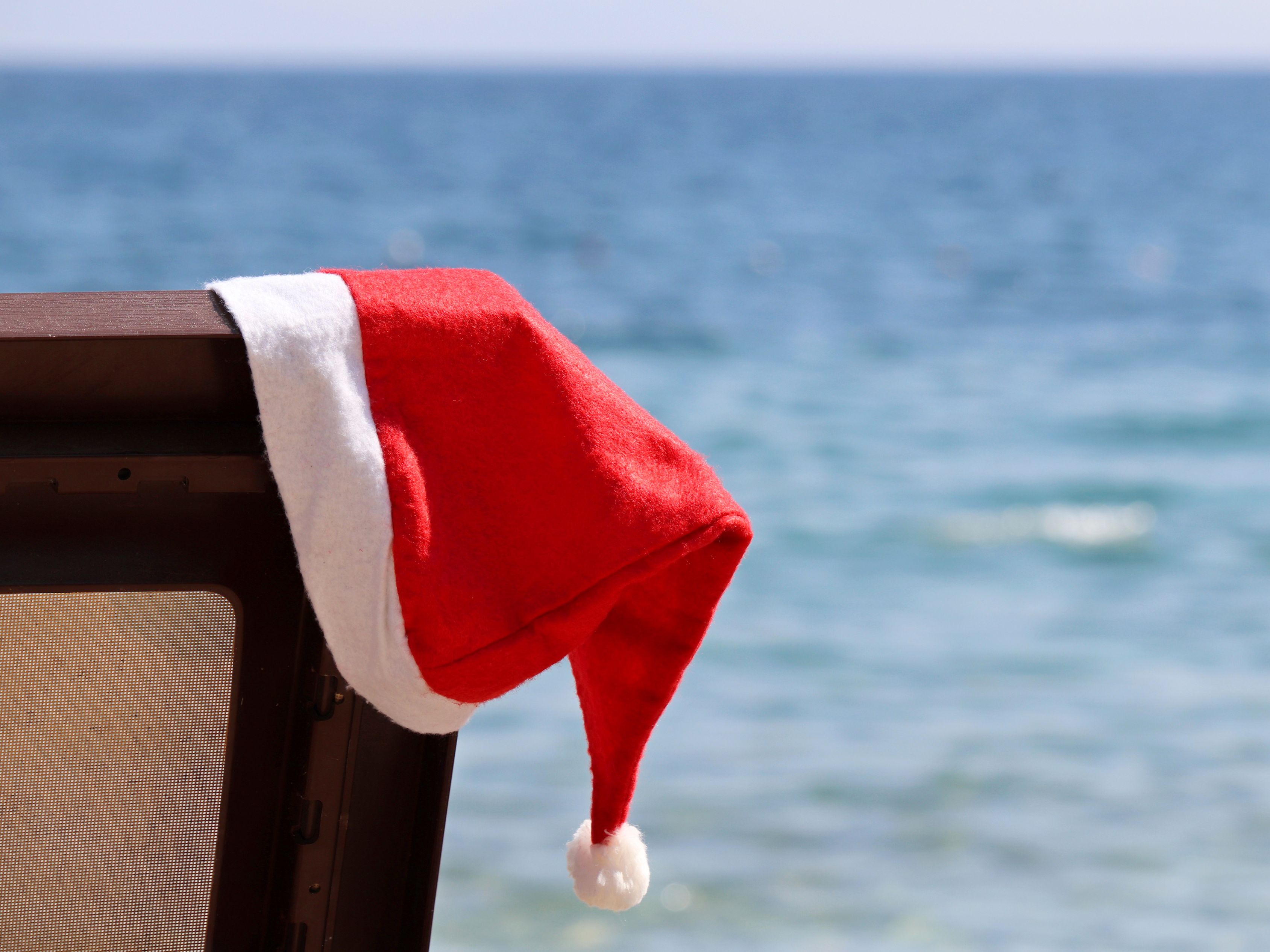 Santa hat on beach chair