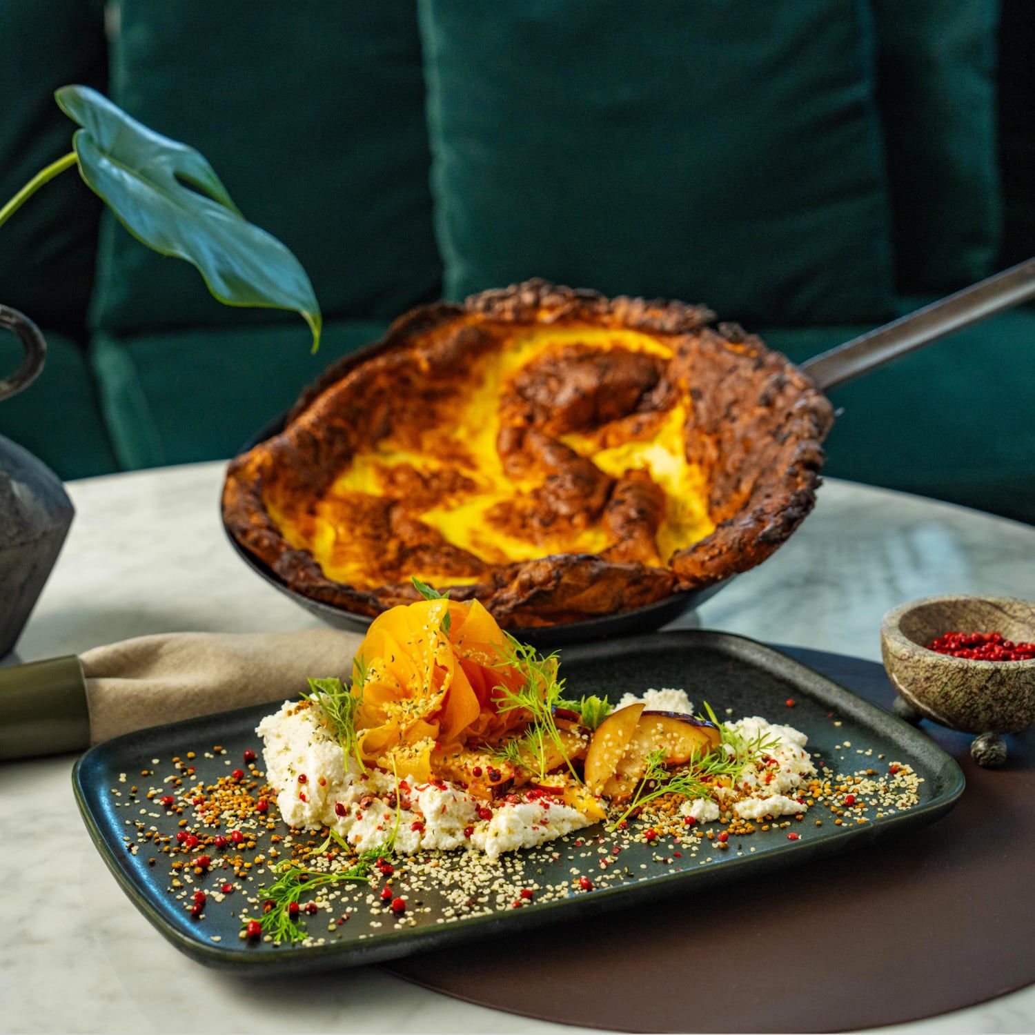 A beautifully plated appetizer of hearth baked bread and Mediterranean dips.