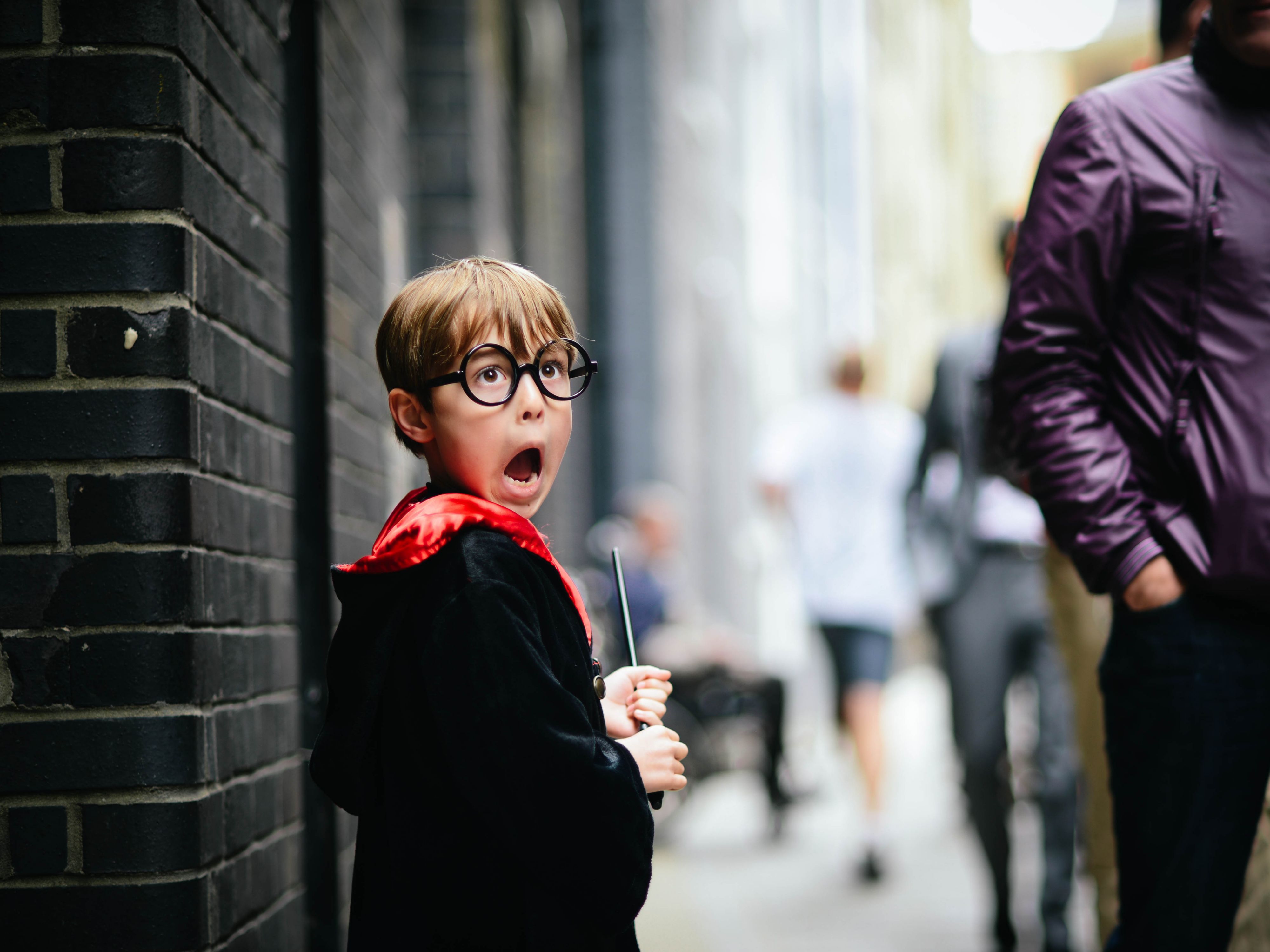 Surprised kid with Harry Potter glasses