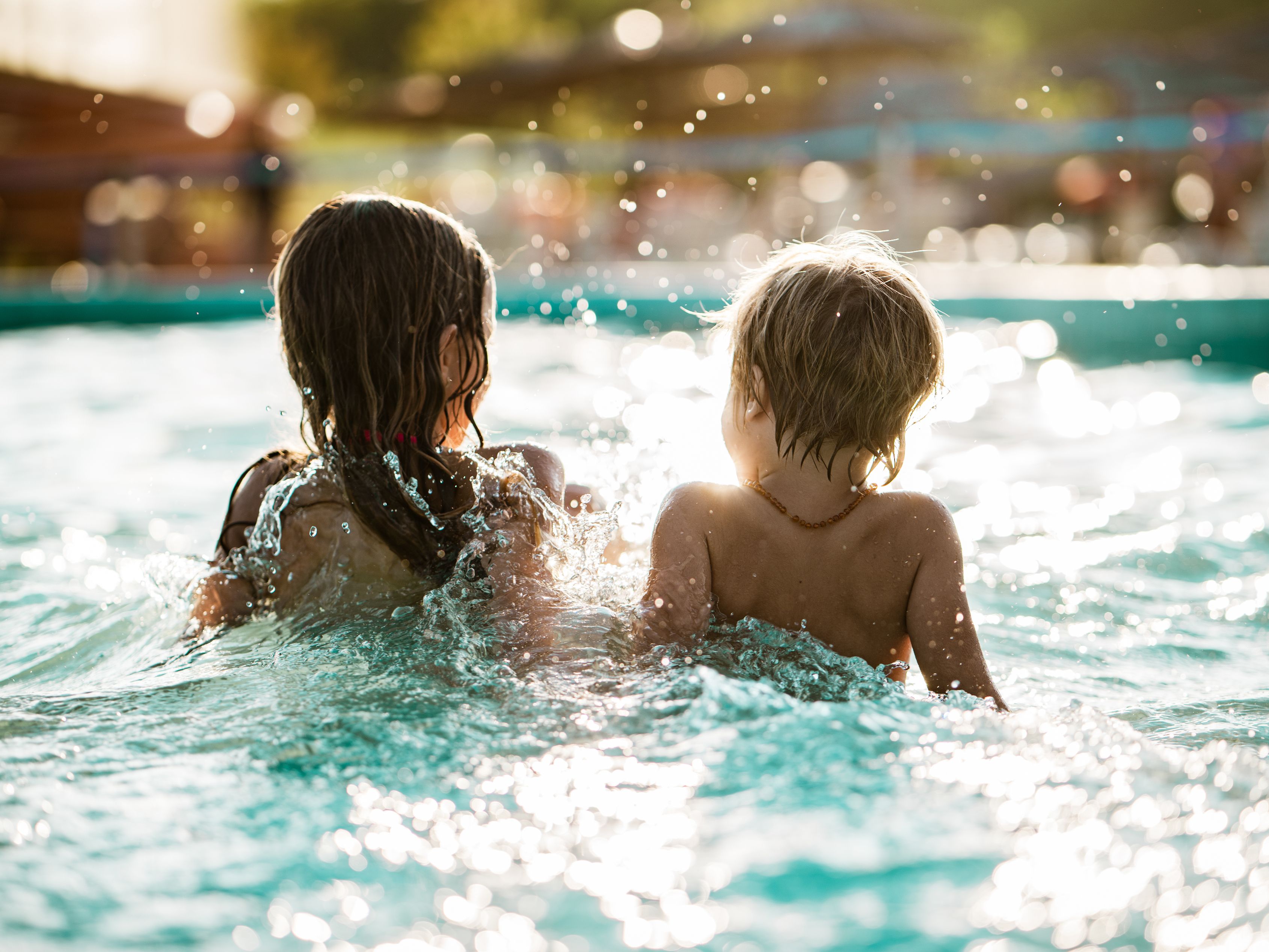 kids splashing in water