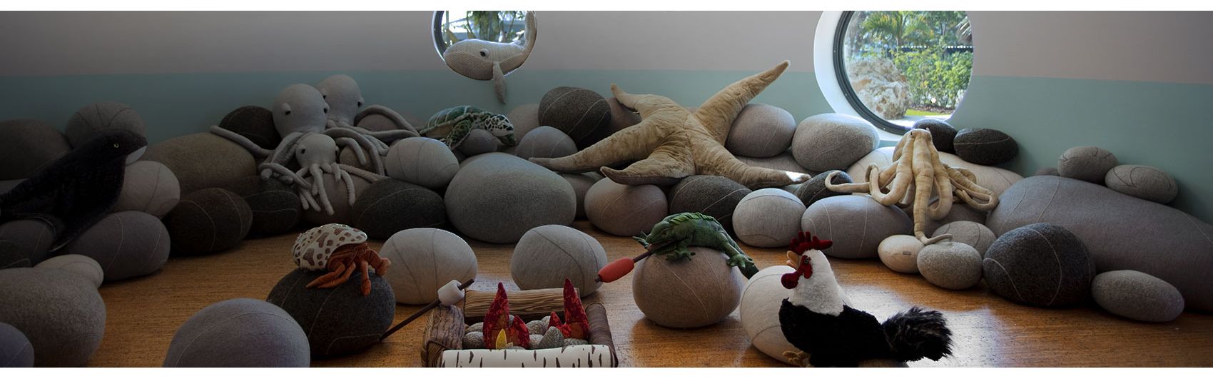 Room with toy stuffed animals on the floor