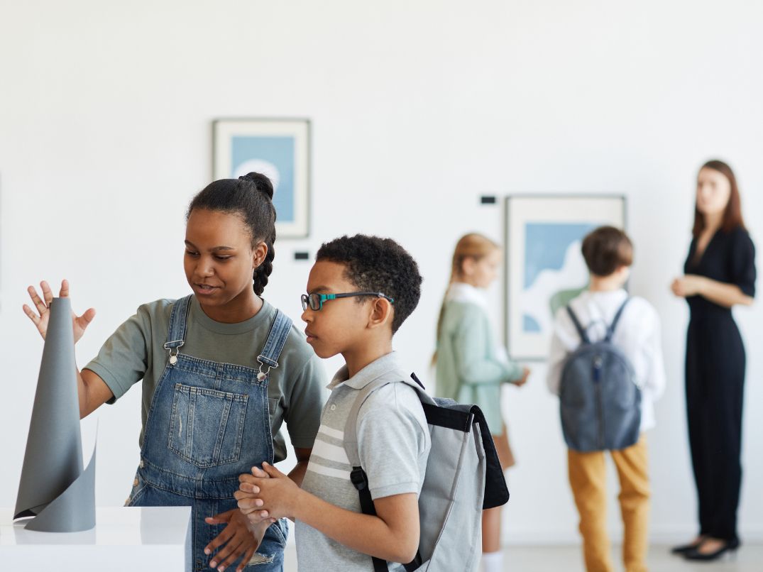 Children exploring art museum