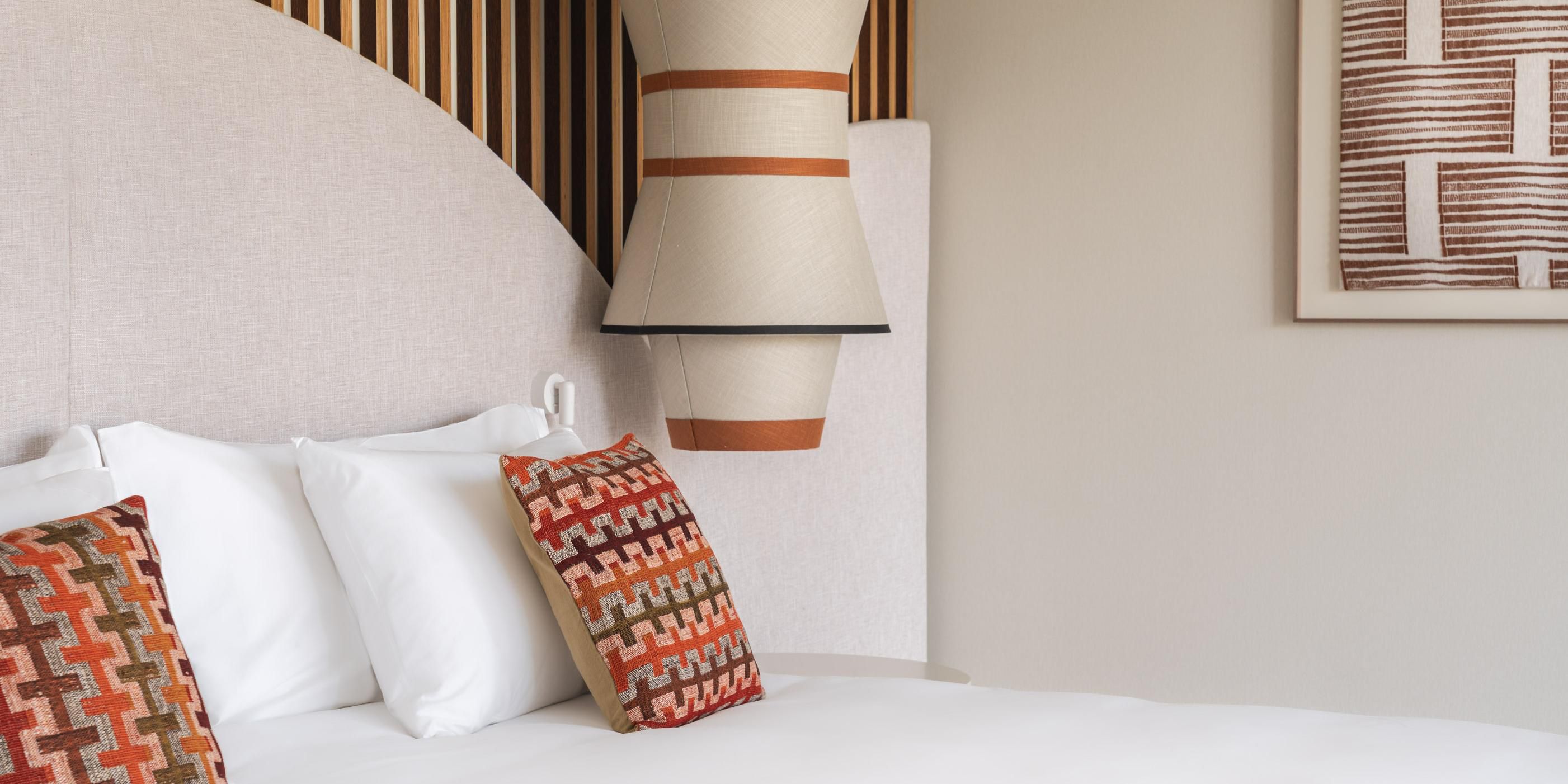  Modern Kimpton Algarve guest room with a cozy king bed.