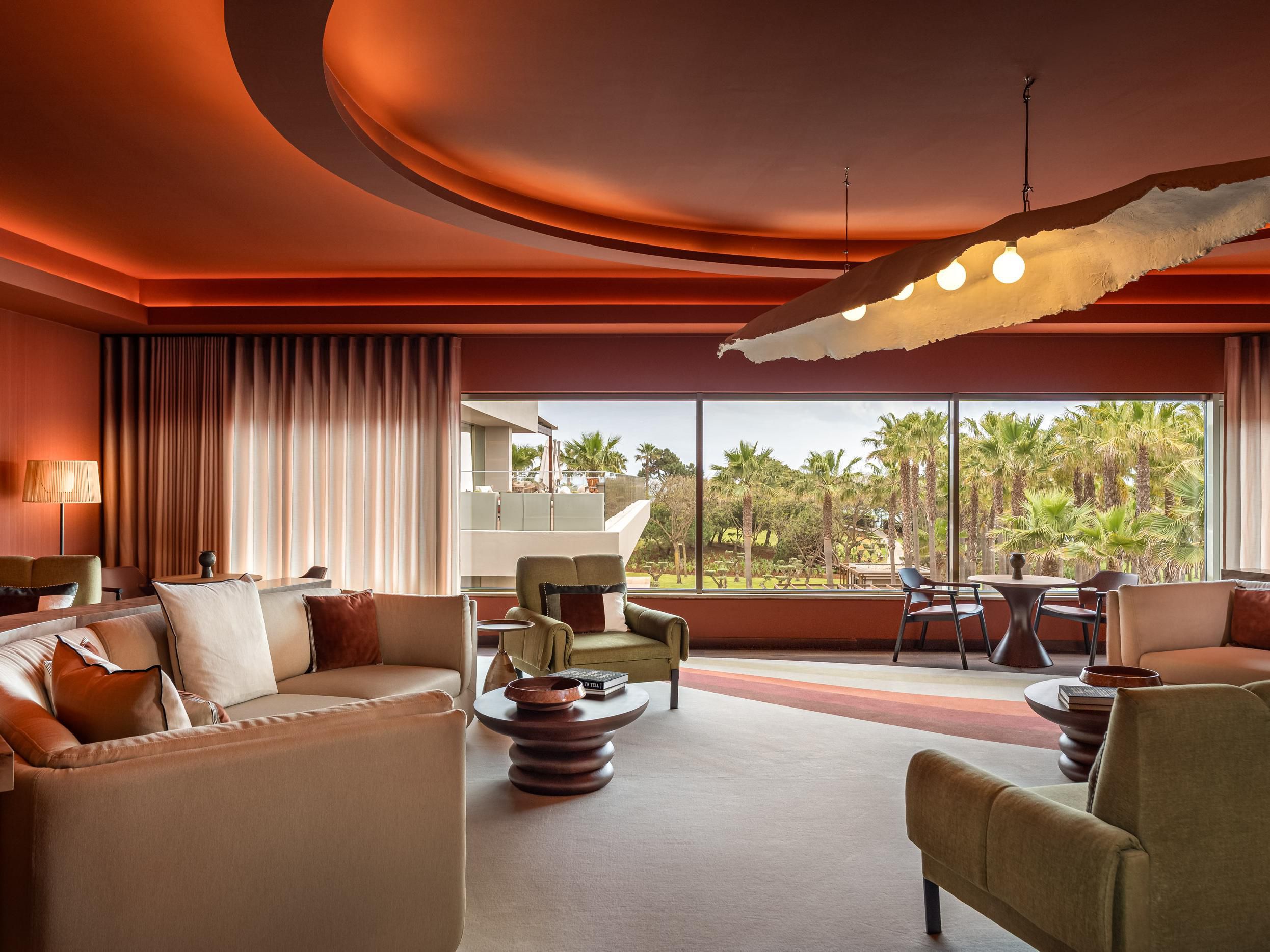  Relaxed lounge overlooking lush palms and gardens