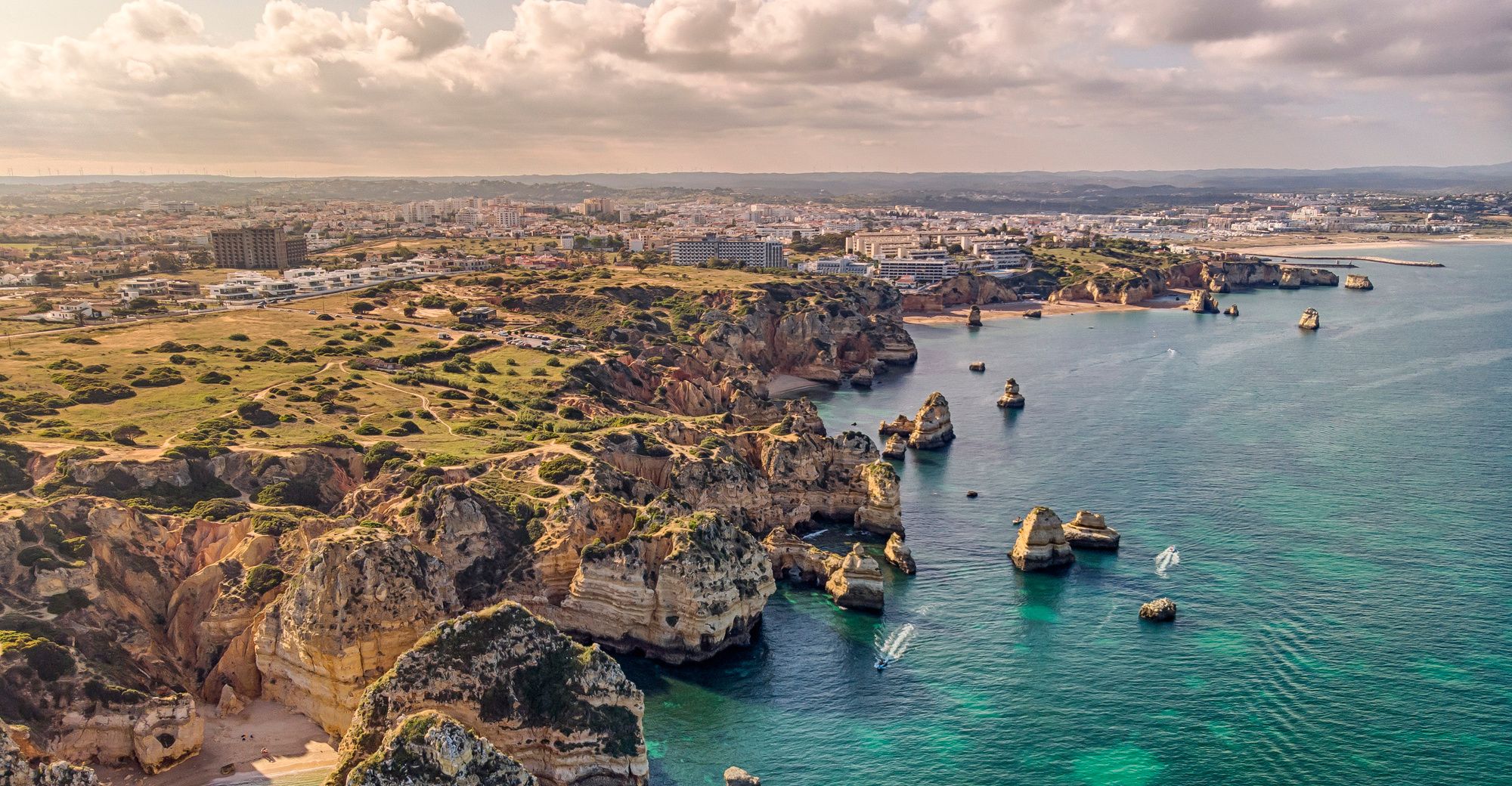 Beautiful image of the Algarve rugged cliffs and sea in portugal