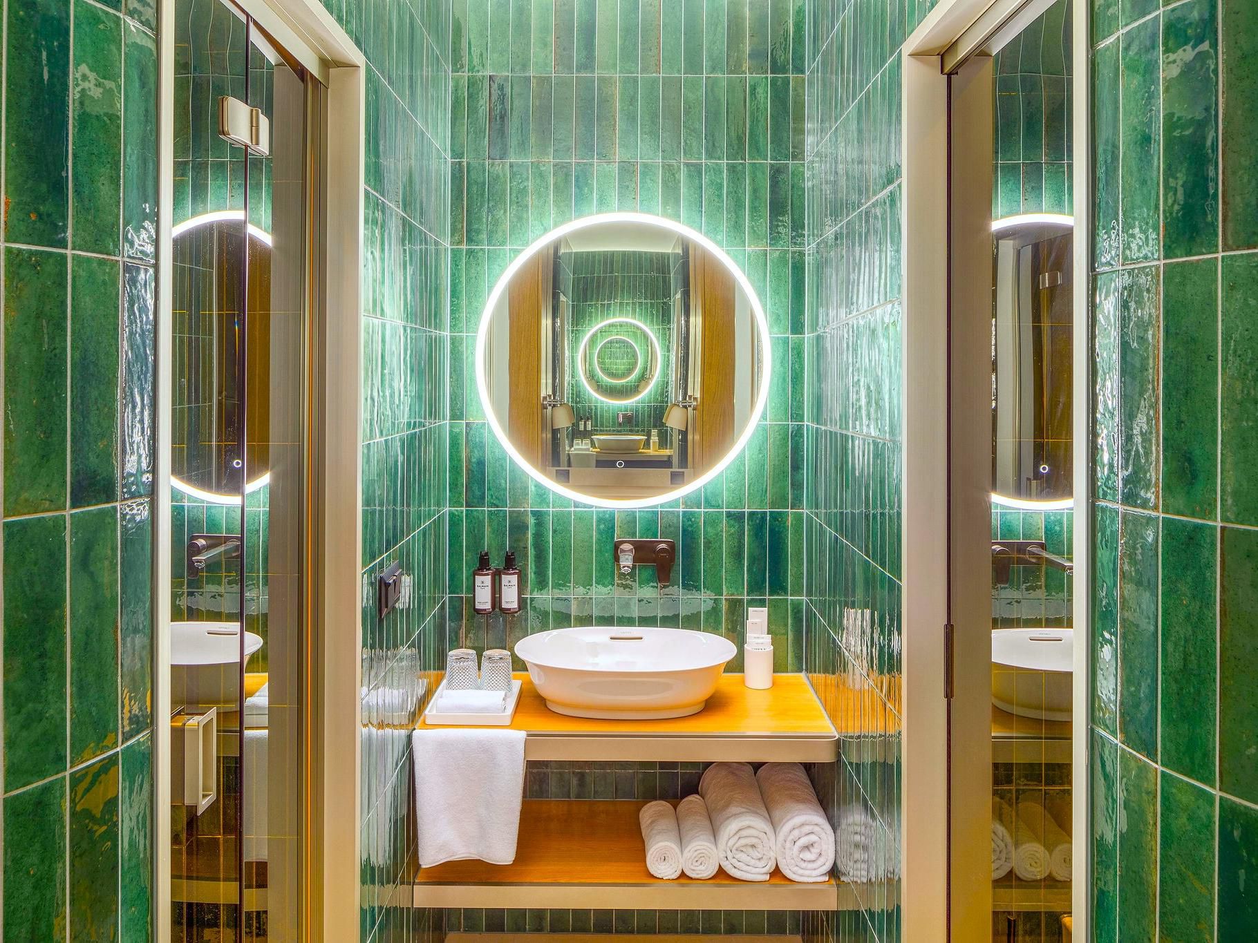 Bathroom with vibrant décor designed by Marcel Wanders.