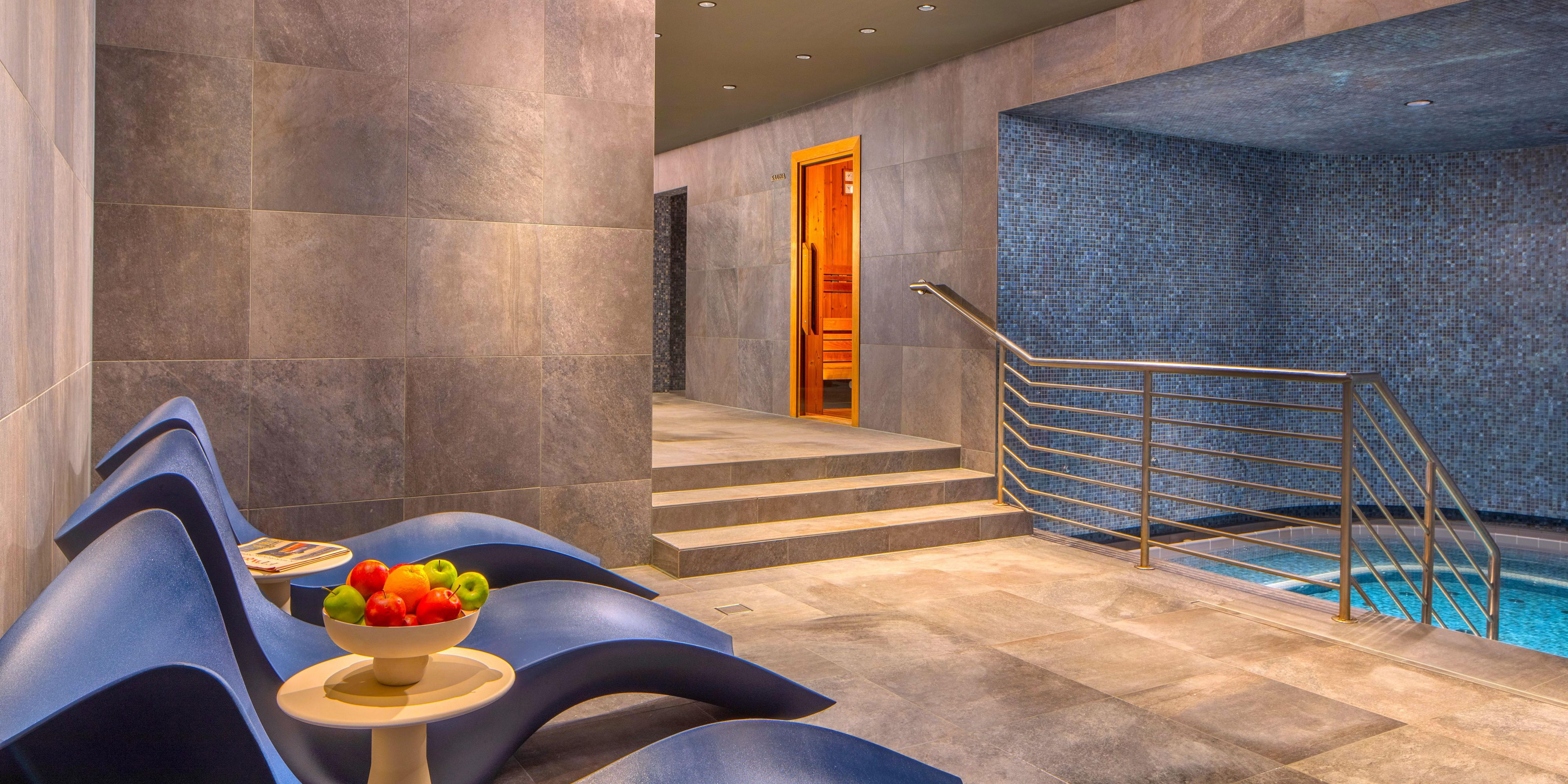 Relaxing area and our large hot tub in the Wellness