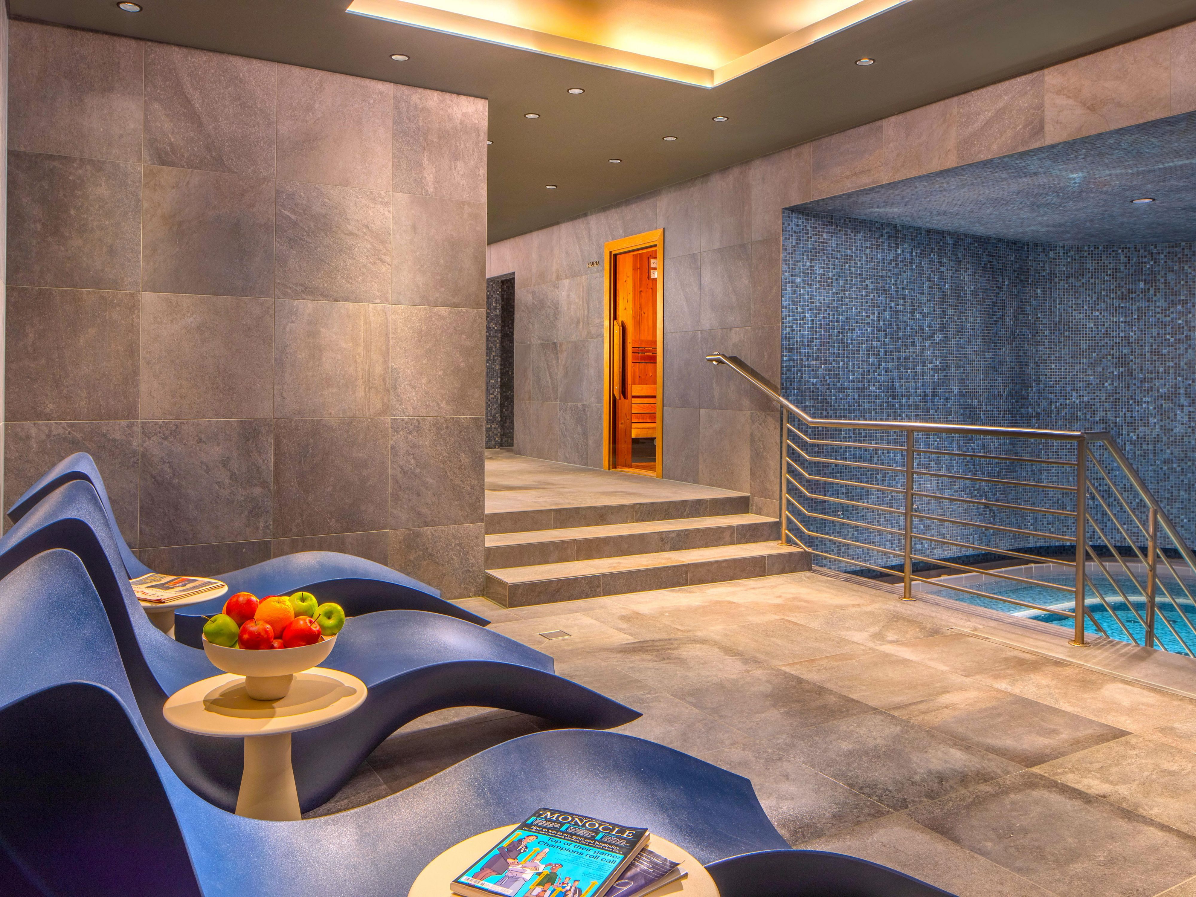Relaxing area and our large hot tub in the Wellness
