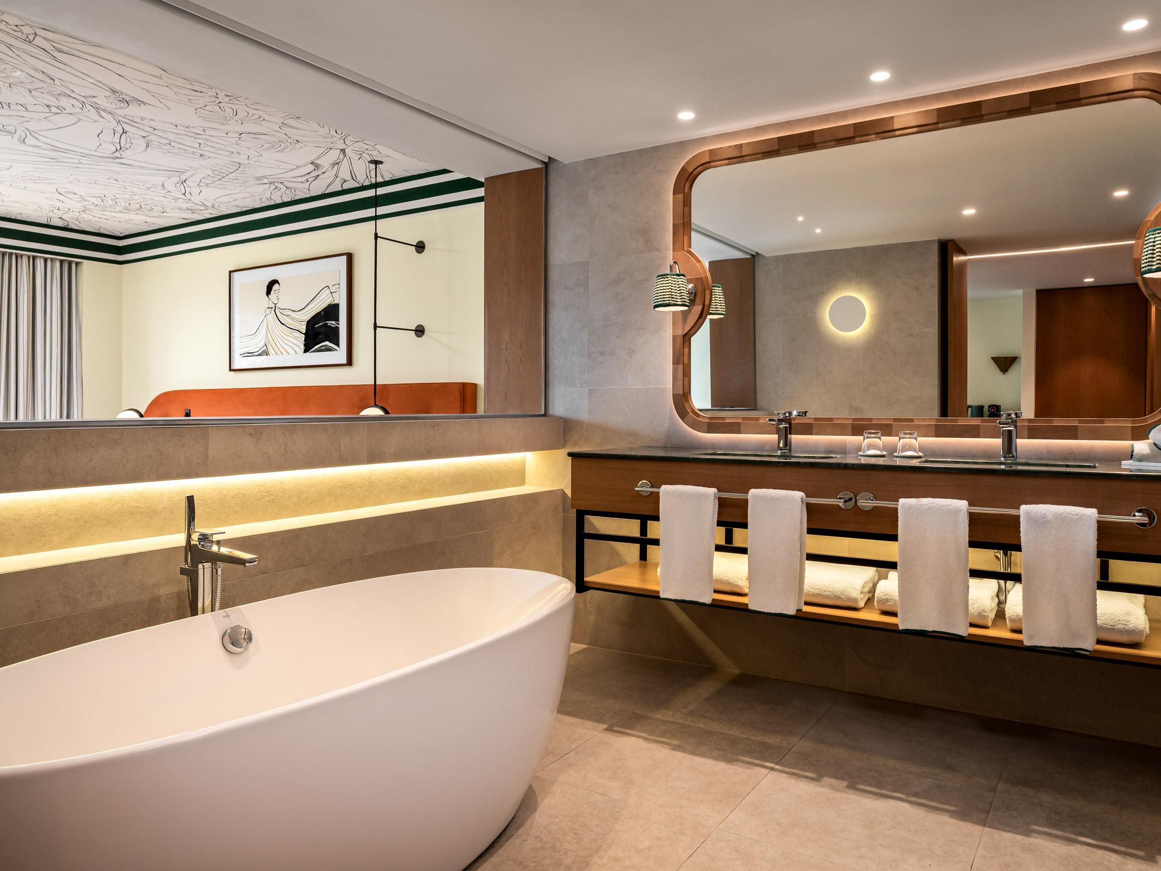 Elegant suite bathroom with premium amenities.