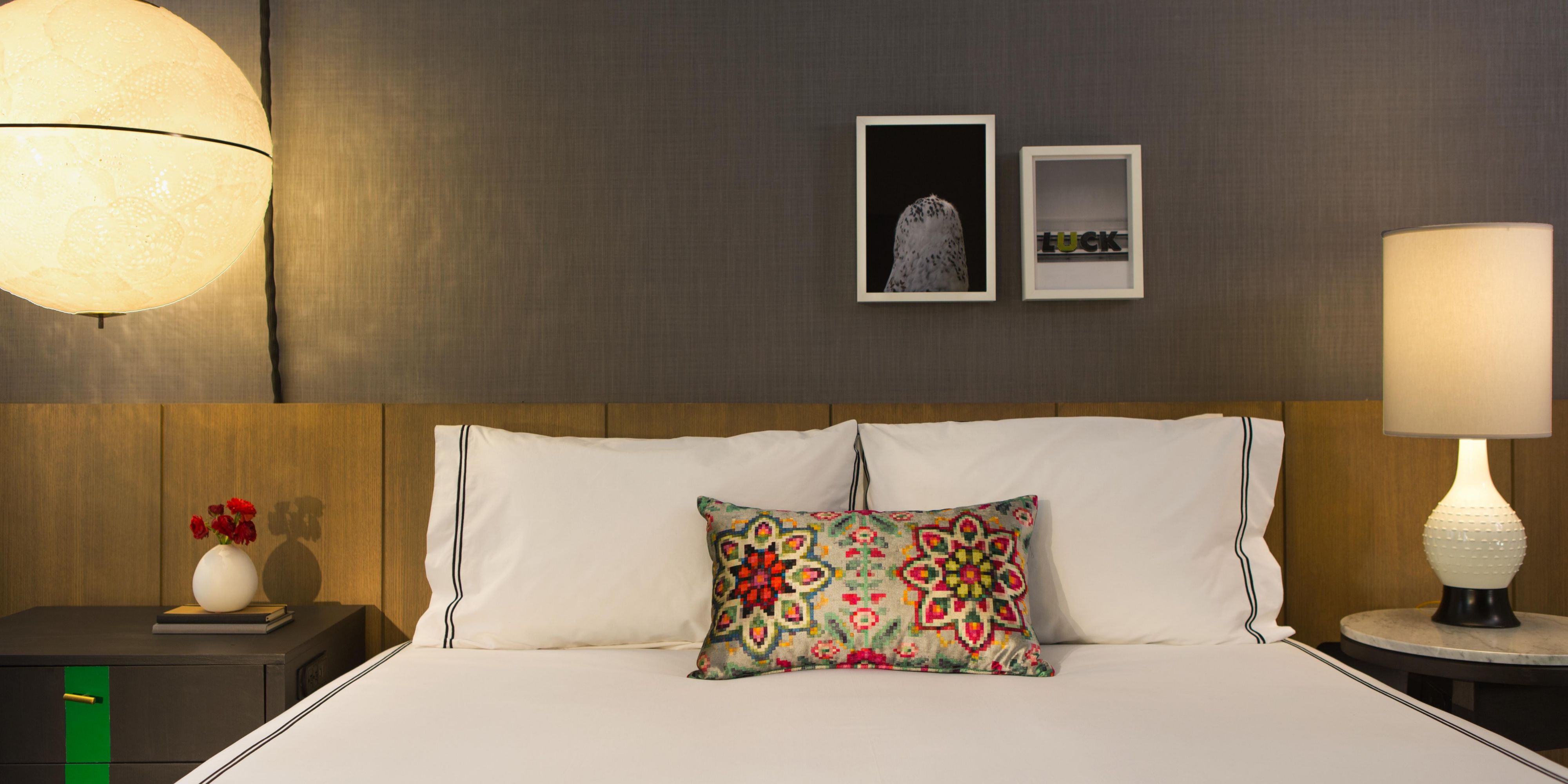 Warm lighting and curated comfort in your Chicago bedroom.