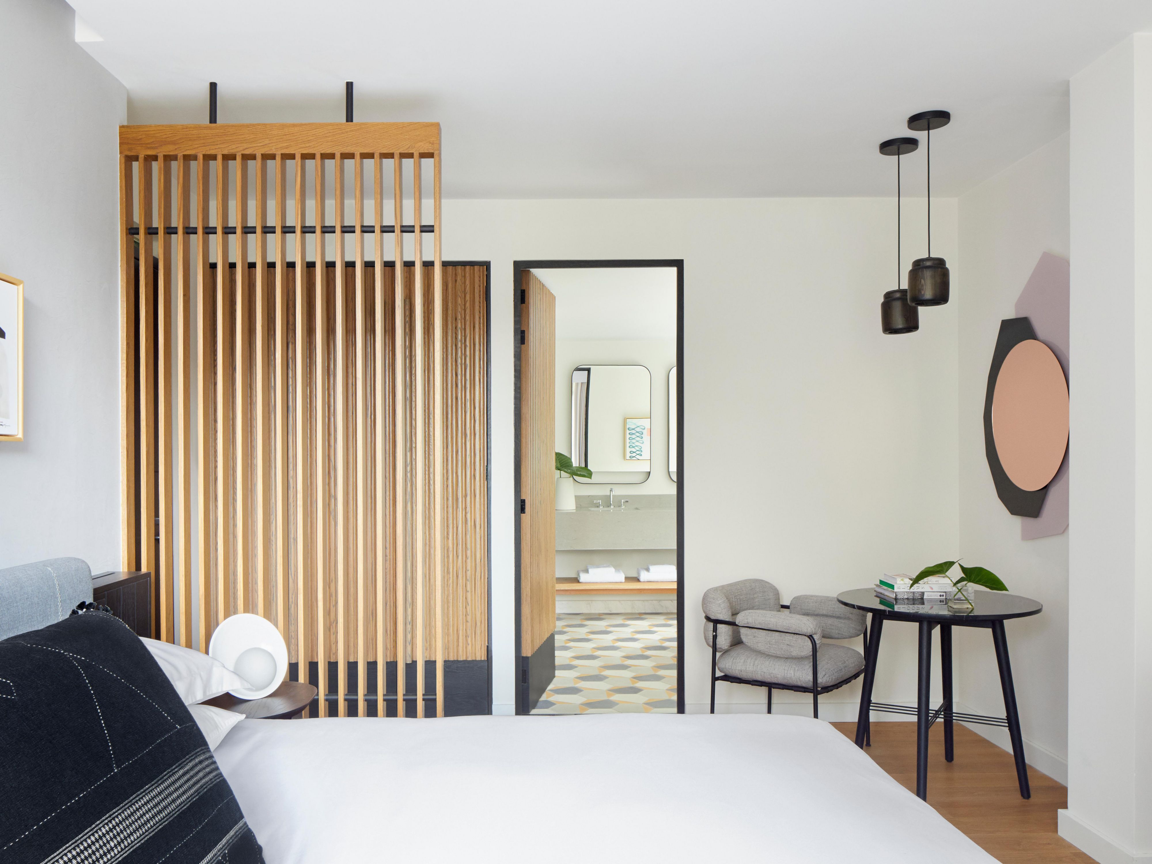 Guest room bathroom entrance at Kimpton El Castelar Polanco