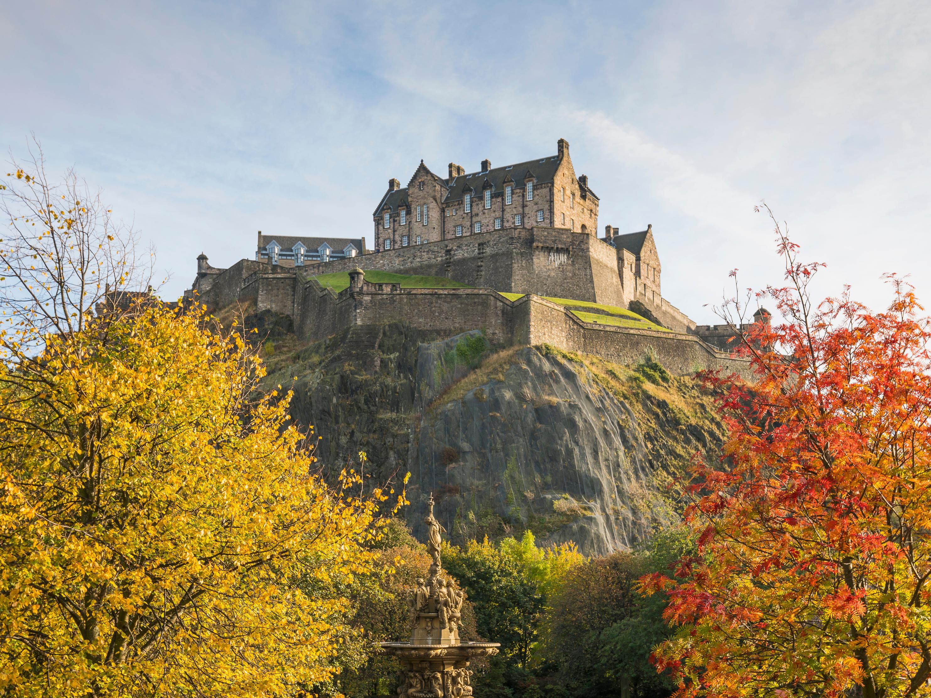 View of Edinburgh castle in the fall foliage